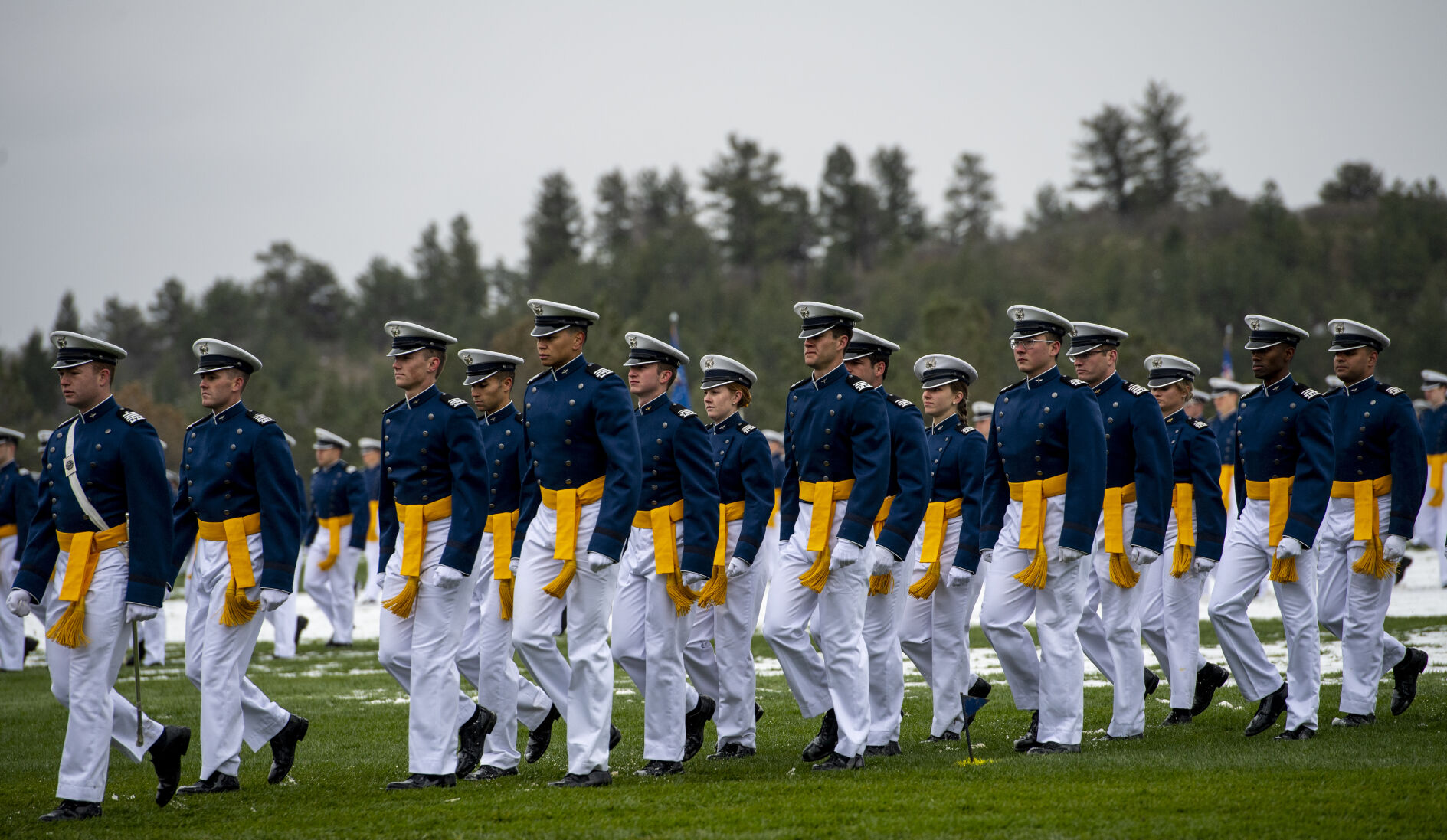 Graduating cadets separate from their squadrons during the Air Force Academy graduation parade at Stillman Parade Field on Tuesday, May 24. (Parker Seibold / The Gazette) (Parker Seibold / The Gazette)