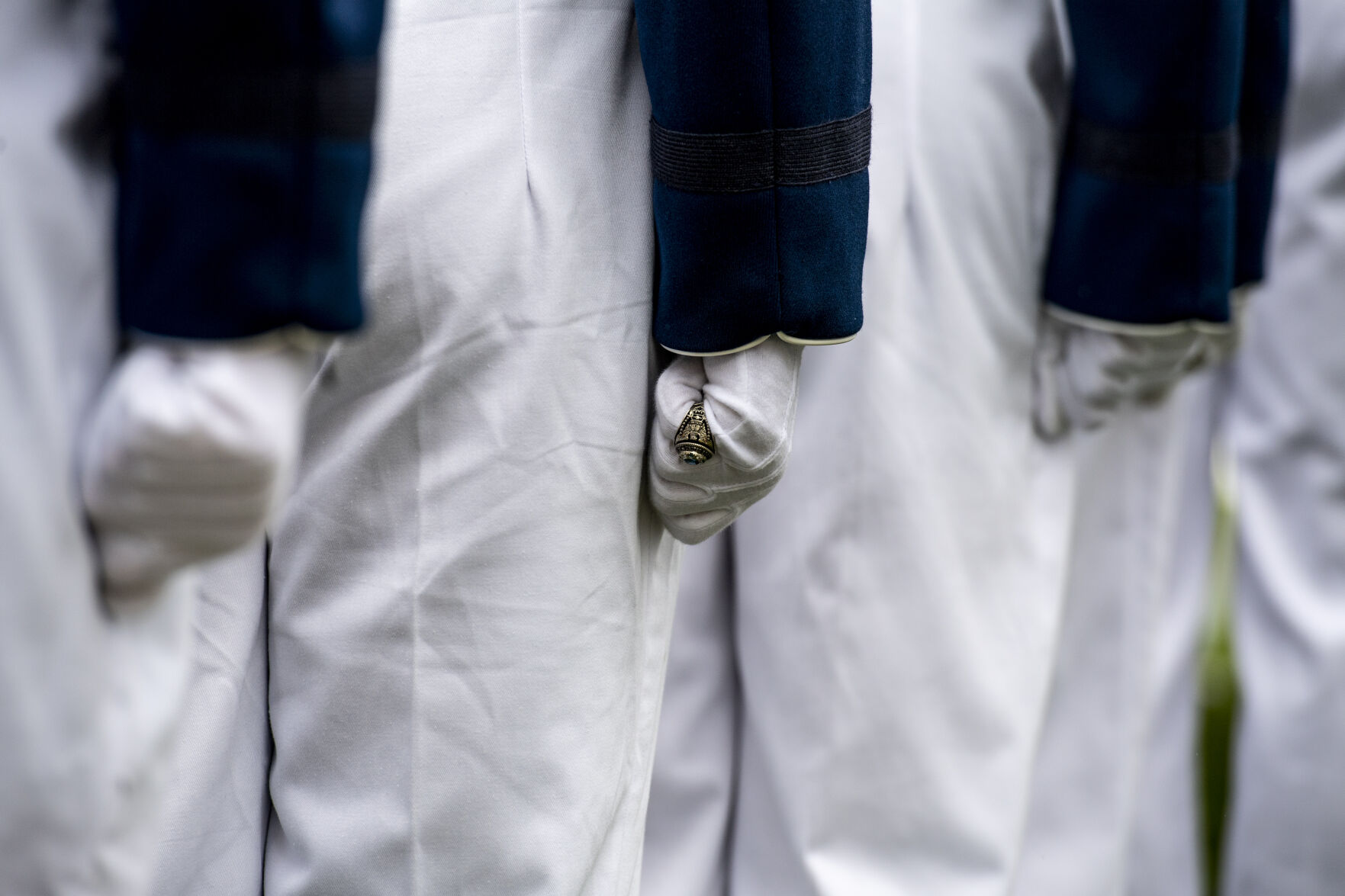 Despite a light drizzle and cold temperatures, prohibiting The Wing Of Blue parachute team from making an appearance, the Air Force Academy’s graduation parade went on as planned at the Sillman Parade Field on Tuesday, May 24. (Parker Seibold / The Gazette) (Parker Seibold / The Gazette)