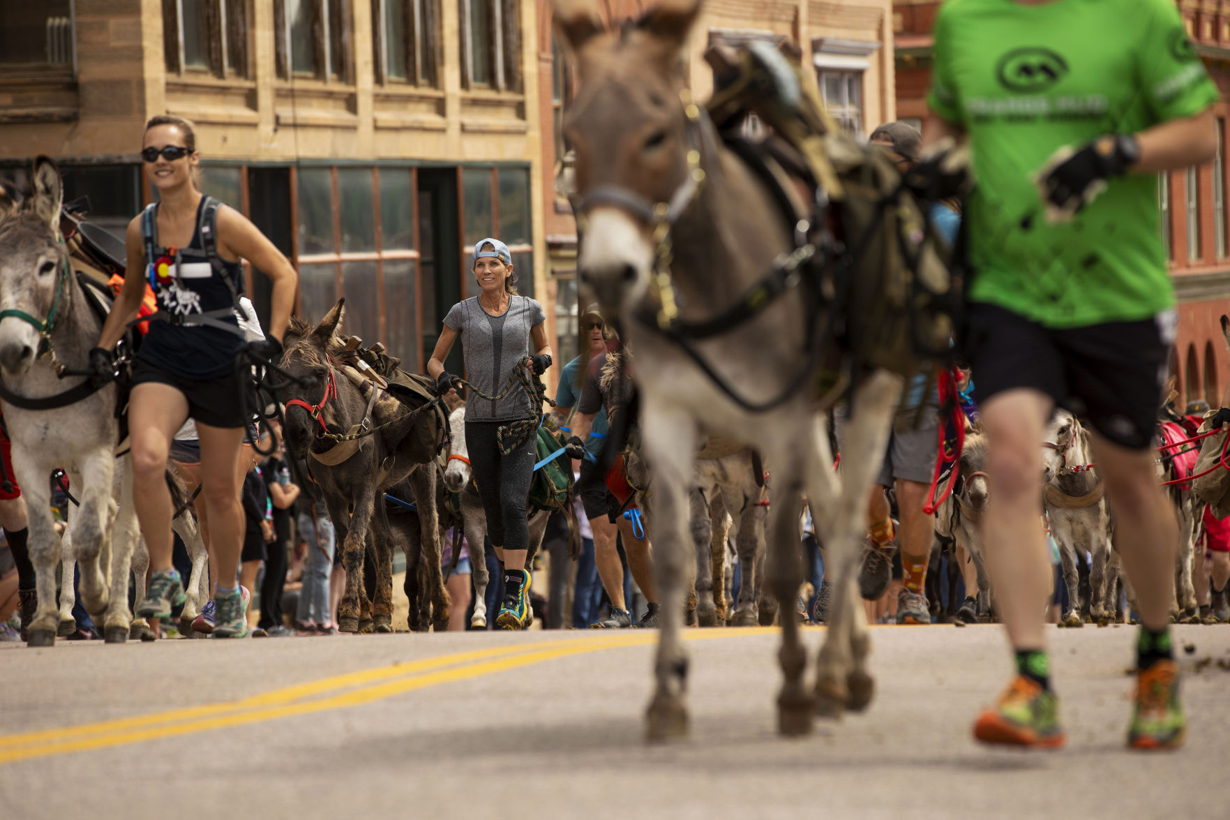 Racers take off with their burros at the start of the Victor Burro Racing Gold Rush Challenge in Victor on Sept. 7, 2019. Burro racing is the official state summer sport. (The Gazette file)
