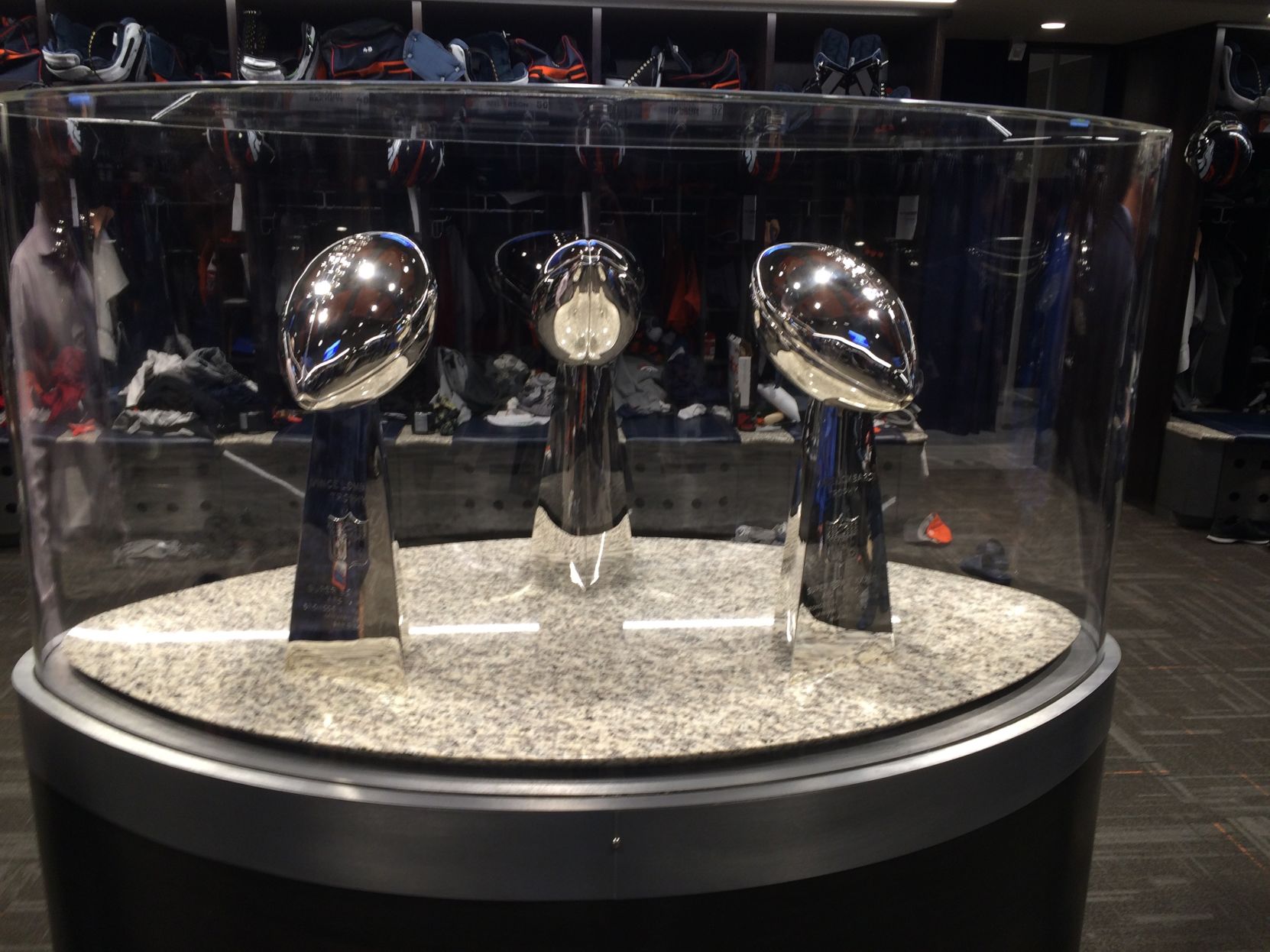 The Denver Broncos installed a trophy case in their locker room to display the franchise's three Lombardi Trophies, including the one from Super Bowl 50 that they won with a 24-10 victory over Carolina on Feb. 7, in Englewood, Colo., Wednesday, Nov. 23, 2016. Players said the gesture is a good reminder of what the next two months are all about. (AP Photo/Arnie Stapleton) (Arnie Stapleton)