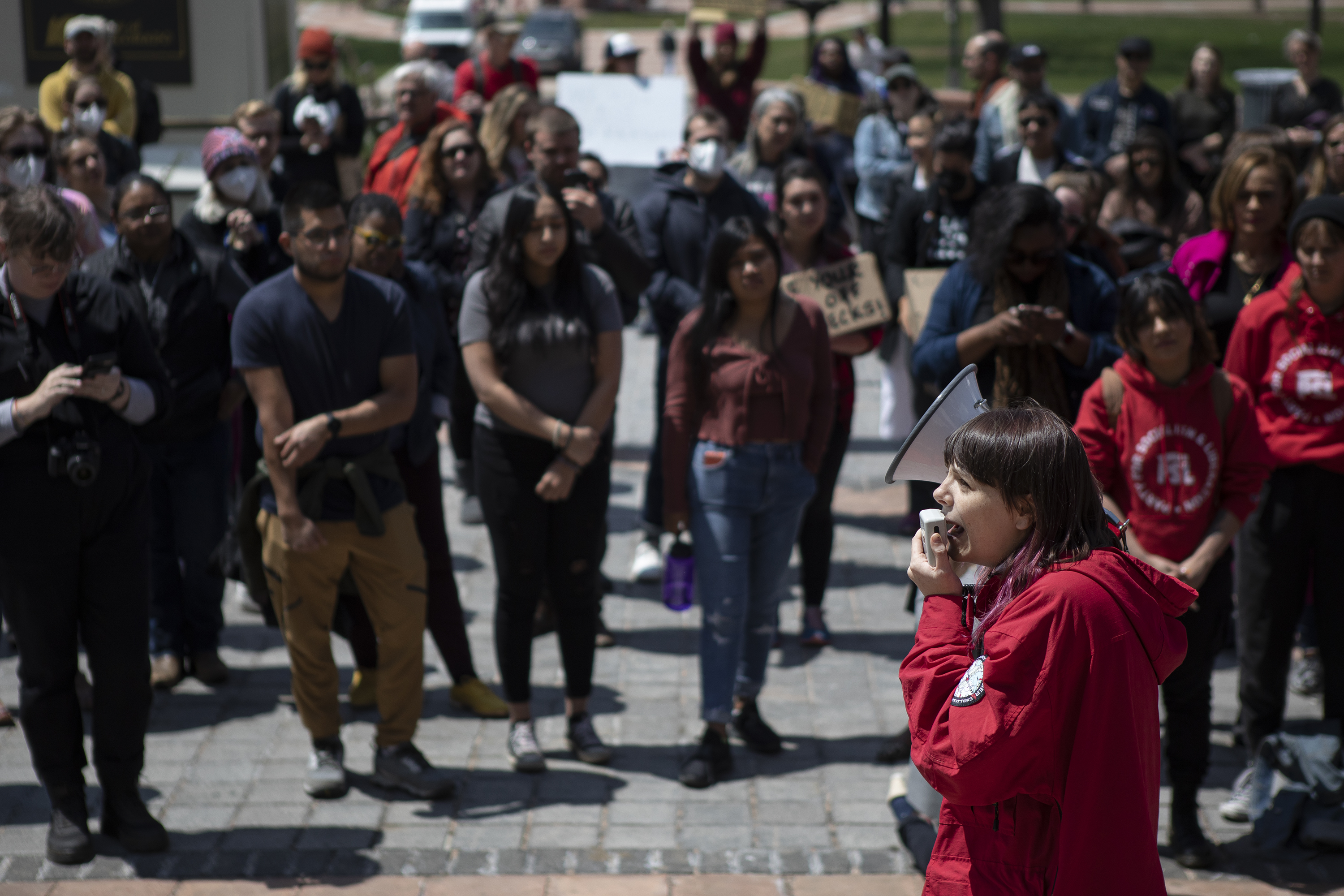 Community organizer Cidney Fisk speaks over a megaphone during an abortion-rights protest on Tuesday, May 3, 2022, on the west steps of the state Capitol building in Denver, Colo. (Timothy Hurst/The Denver Gazette) (Timothy Hurst)