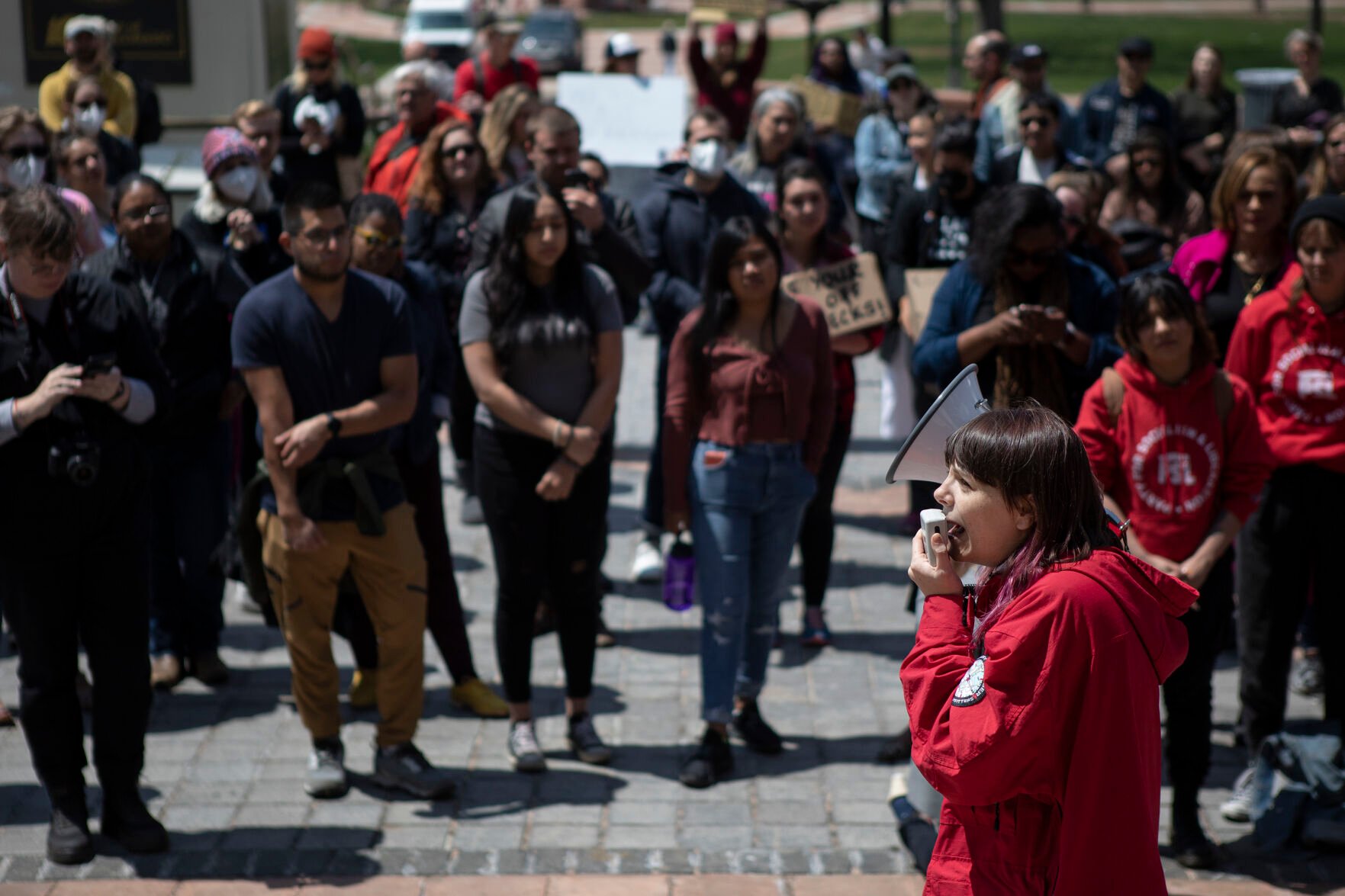 Community organizer Cidney Fisk speaks over a megaphone during an abortion-rights protest on Tuesday, May 3, 2022, on the west steps of the state Capitol building in Denver, Colo. (Timothy Hurst/The Denver Gazette) (Timothy Hurst)