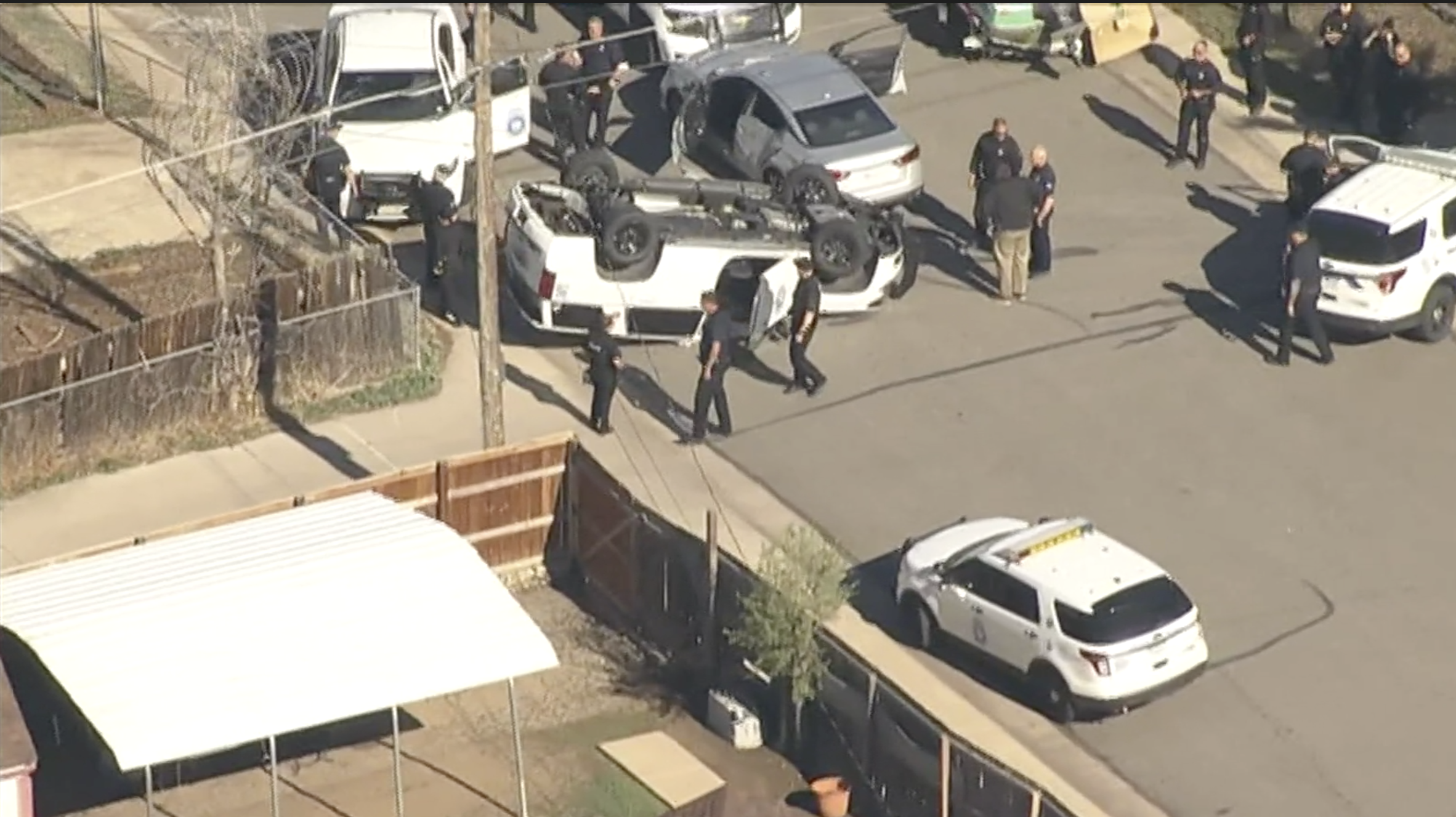 Two Denver officers injured in rollover crash while pursuing shooting suspect