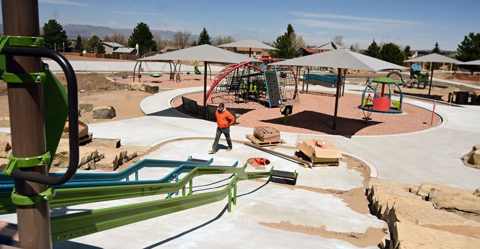 Panorama Park will be reopening in southeastern Colorado Springs on July 16 with a complete makeover. Mayor Suthers and other area park representatives toured the park as it nears the end of construction on Tuesday, May 3, 2022. The new universal playground will ensure that children and visitors of all abilities can access the fun, park officials said.  (Photo by Jerilee Bennett, The Gazette) (Jerilee Bennett)