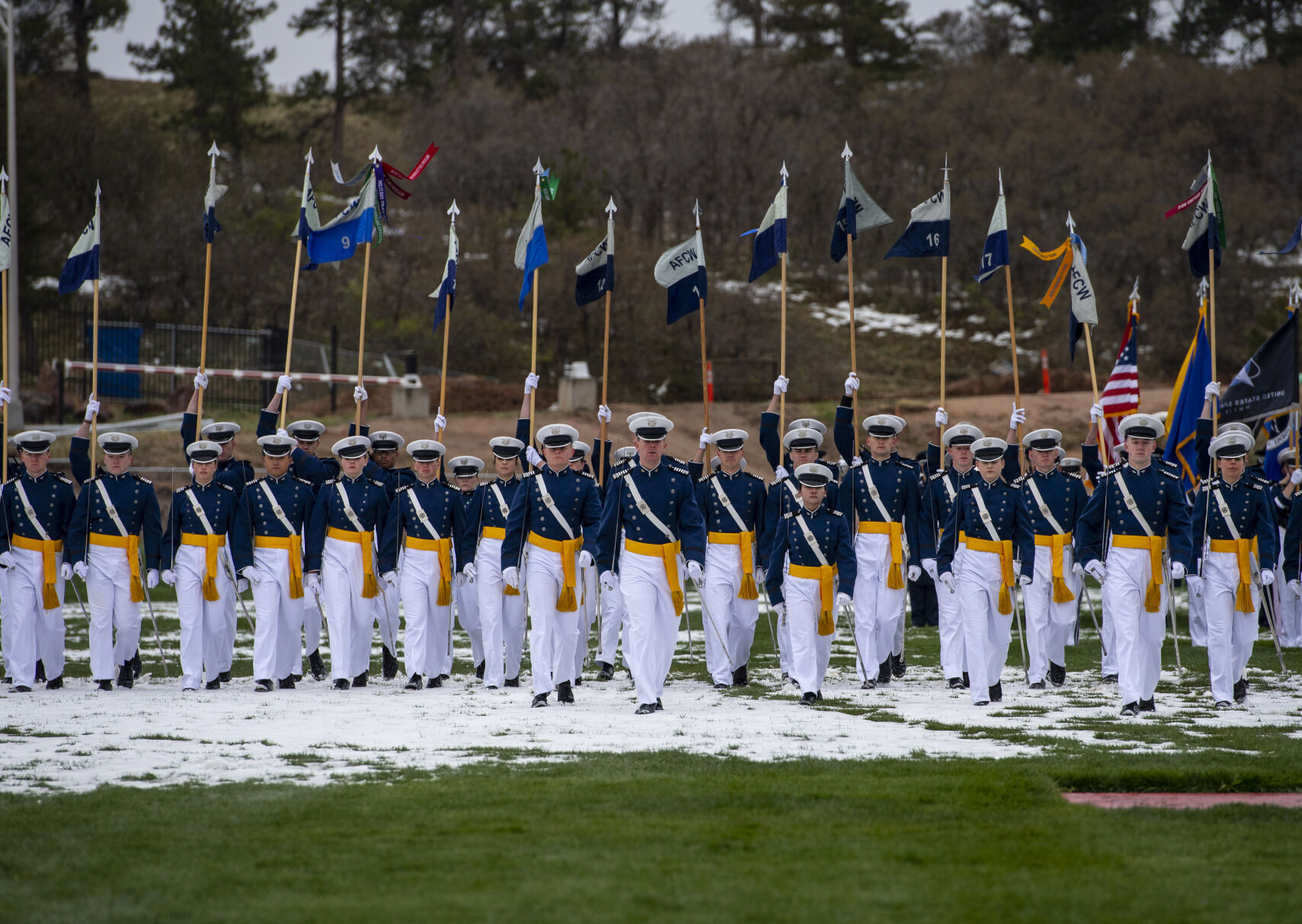Despite a light drizzle and cold temperatures, prohibiting The Wing Of Blue parachute team from making an appearance, the Air Force Academy’s graduation parade went on as planned at the Sillman Parade Field on Tuesday, May 24. (Parker Seibold / The Gazette) (Parker Seibold / The Gazette)