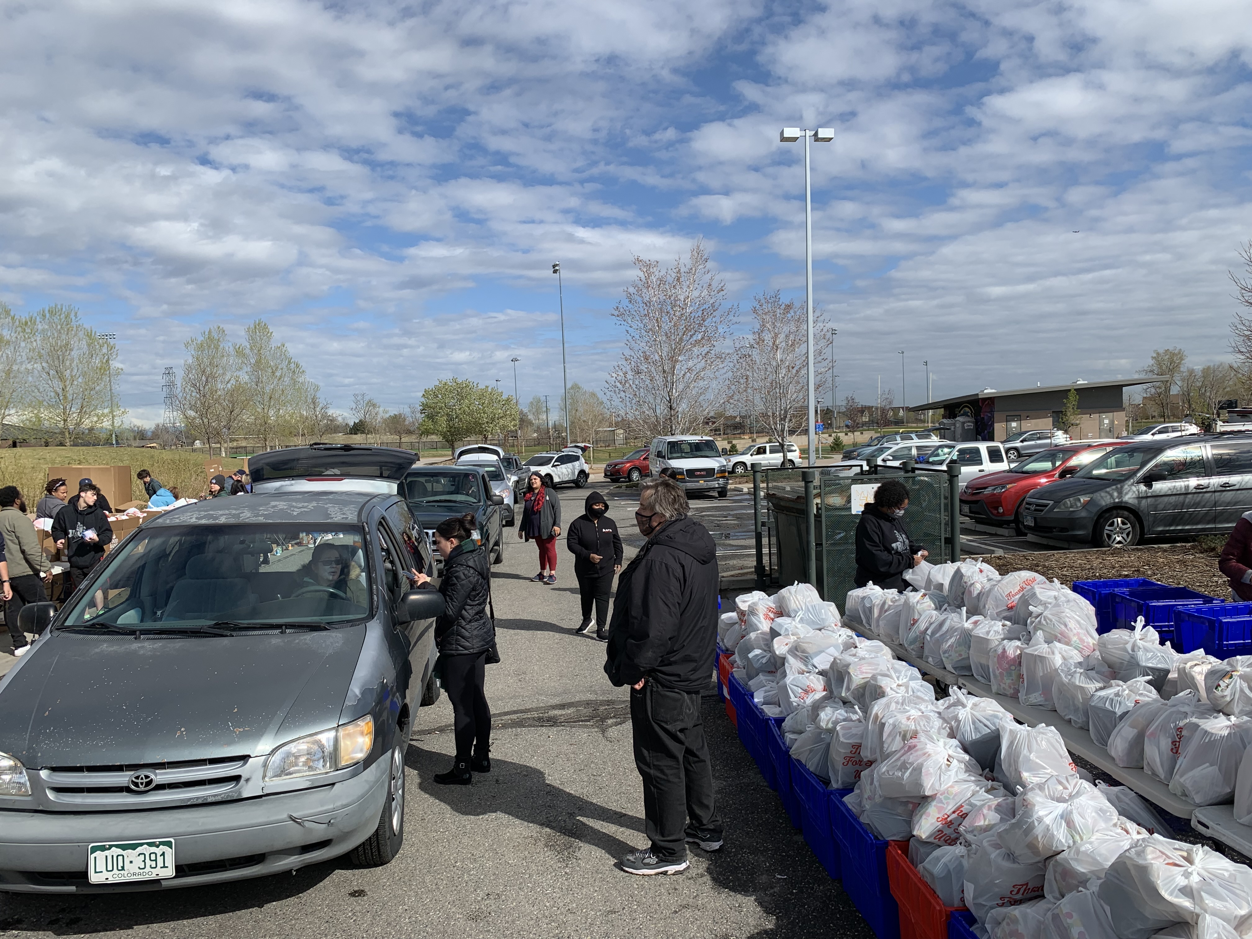 A line of cars waits for food boxes distributed by volunteers for the Food Bank of the Rockies mobile food pantry at Montbello Recreation Center in Aurora Thursday. (DennisHuspeniCity Editordennis.huspeni@gazette.comhttps://denvergazette.com/content/tncms/avatars/c/5a/fbd/c5afbd32-5030-11eb-bdef-030d9de52a9e.779683cee495ffe64766291c251a8894.png)