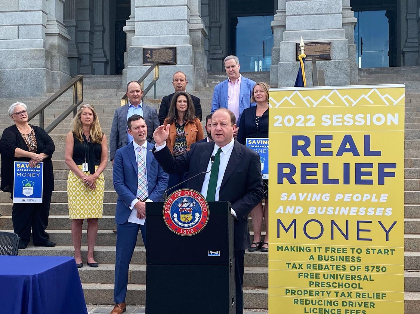 Gov. Polis signs $700 million property tax relief bill, other cost-saving legislation