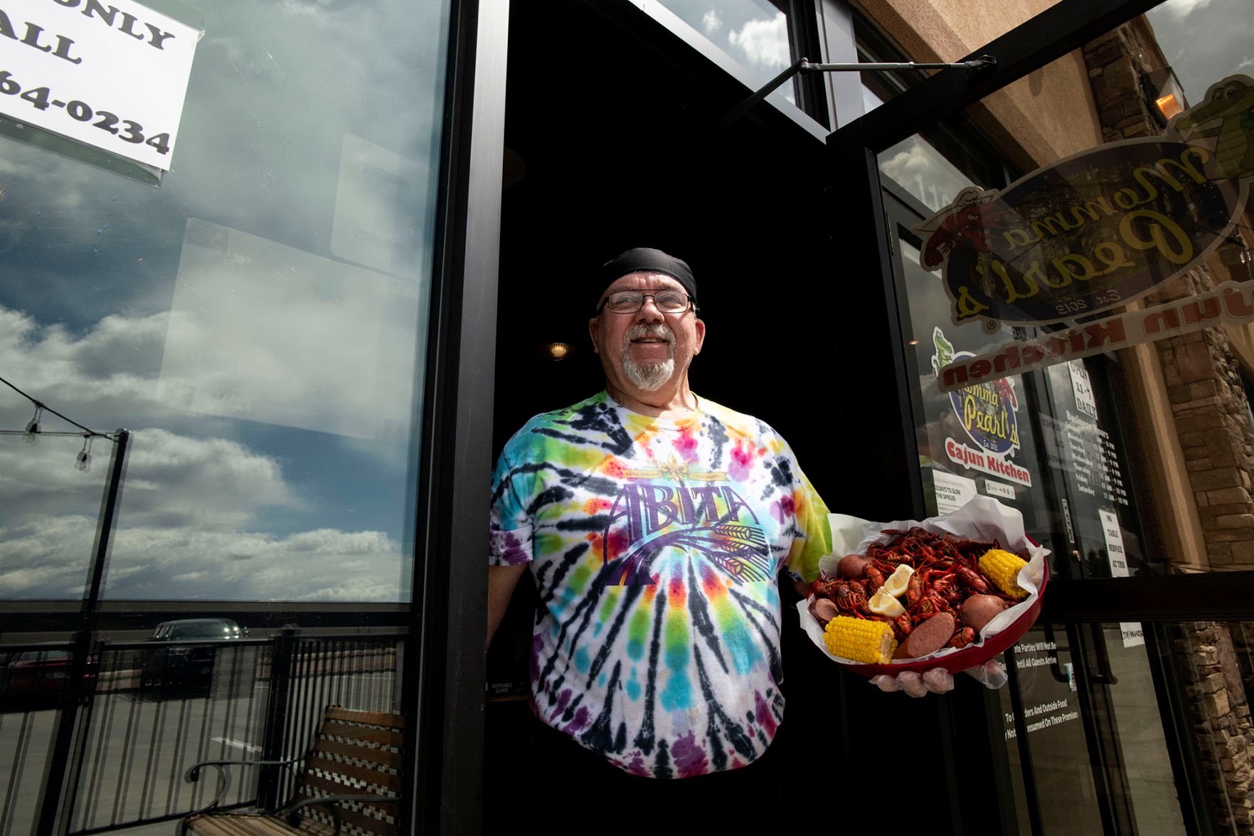 Executive chef Robert Brunet holds a 3-pound crawfish platter at his restaurant, Momma Pearl’s Cajun Kitchen in Colorado Springs. (the Gazette file)