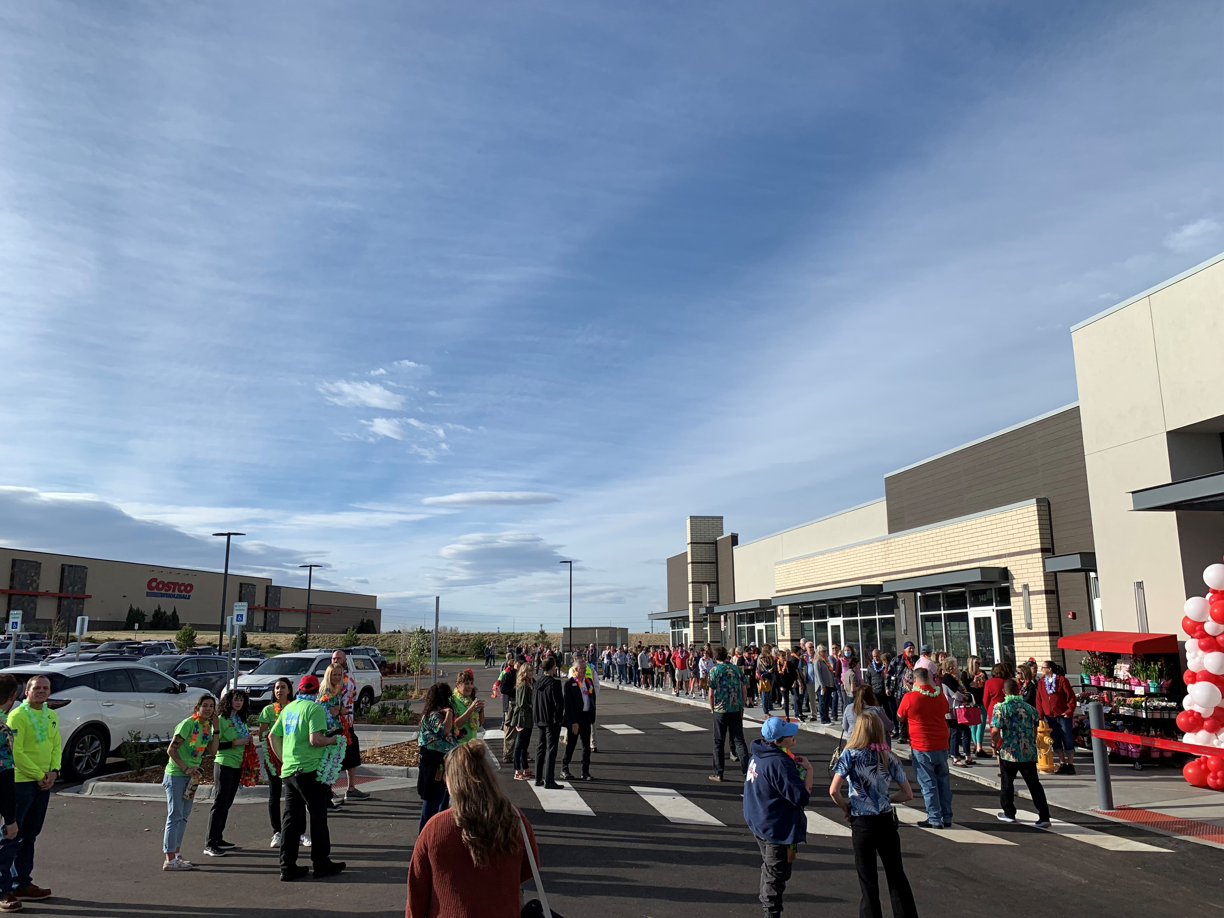 Crowds of shoppers line up for the Friday morning opening of the Trader Joe's in Parker. (DENNIS HUSPENI/THE DENVER GAZETTE)