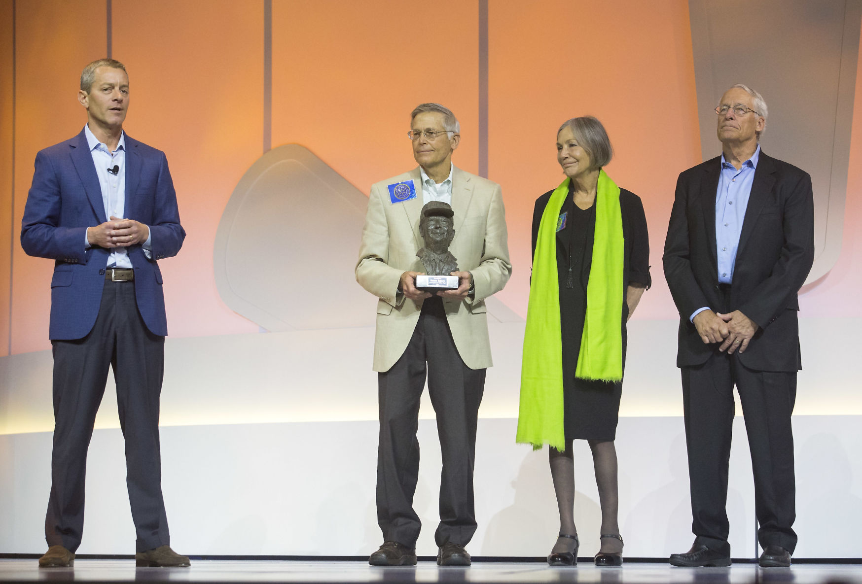 Greg Penner, left, board chairman, speaks alongside Jim Walton, Alice Walton and Rob Walton for the presentation of the Sam Walton Award during the Walmart shareholders meeting Friday, June 2, 2017, at Bud Walton Arena in Fayetteville, Ark. (Jason Ivester/The Northwest Arkansas Democrat-Gazette via AP) (Jason Ivester)