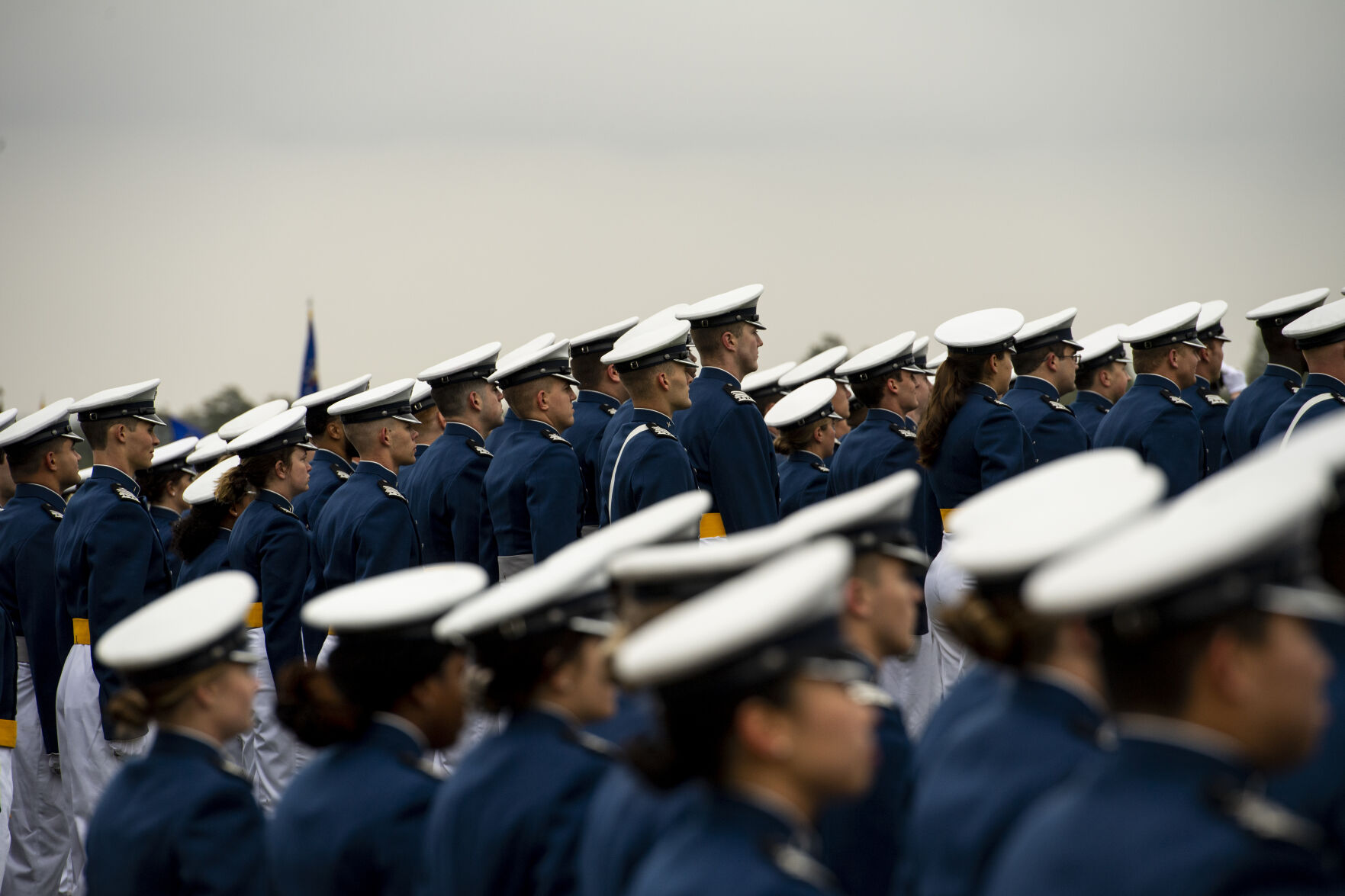 Despite a light drizzle and cold temperatures, prohibiting The Wing Of Blue parachute team from making an appearance, the Air Force Academy’s graduation parade went on as planned at the Sillman Parade Field on Tuesday, May 24. (Parker Seibold / The Gazette) (Parker Seibold / The Gazette)