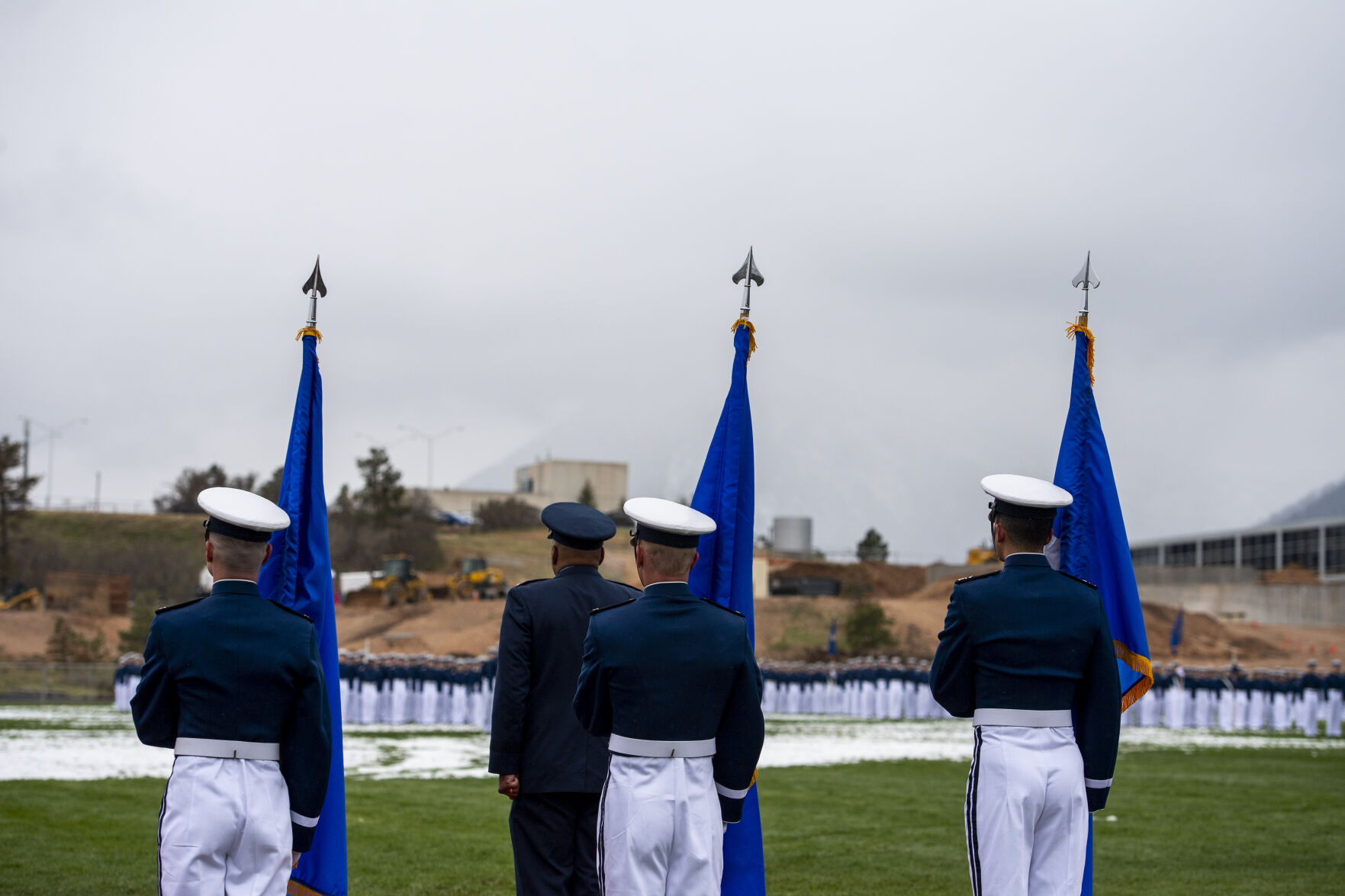 Despite a light drizzle and cold temperatures, prohibiting The Wing Of Blue parachute team from making an appearance, the Air Force Academy’s graduation parade went on as planned at the Sillman Parade Field on Tuesday, May 24. (Parker Seibold / The Gazette) (Parker Seibold / The Gazette)