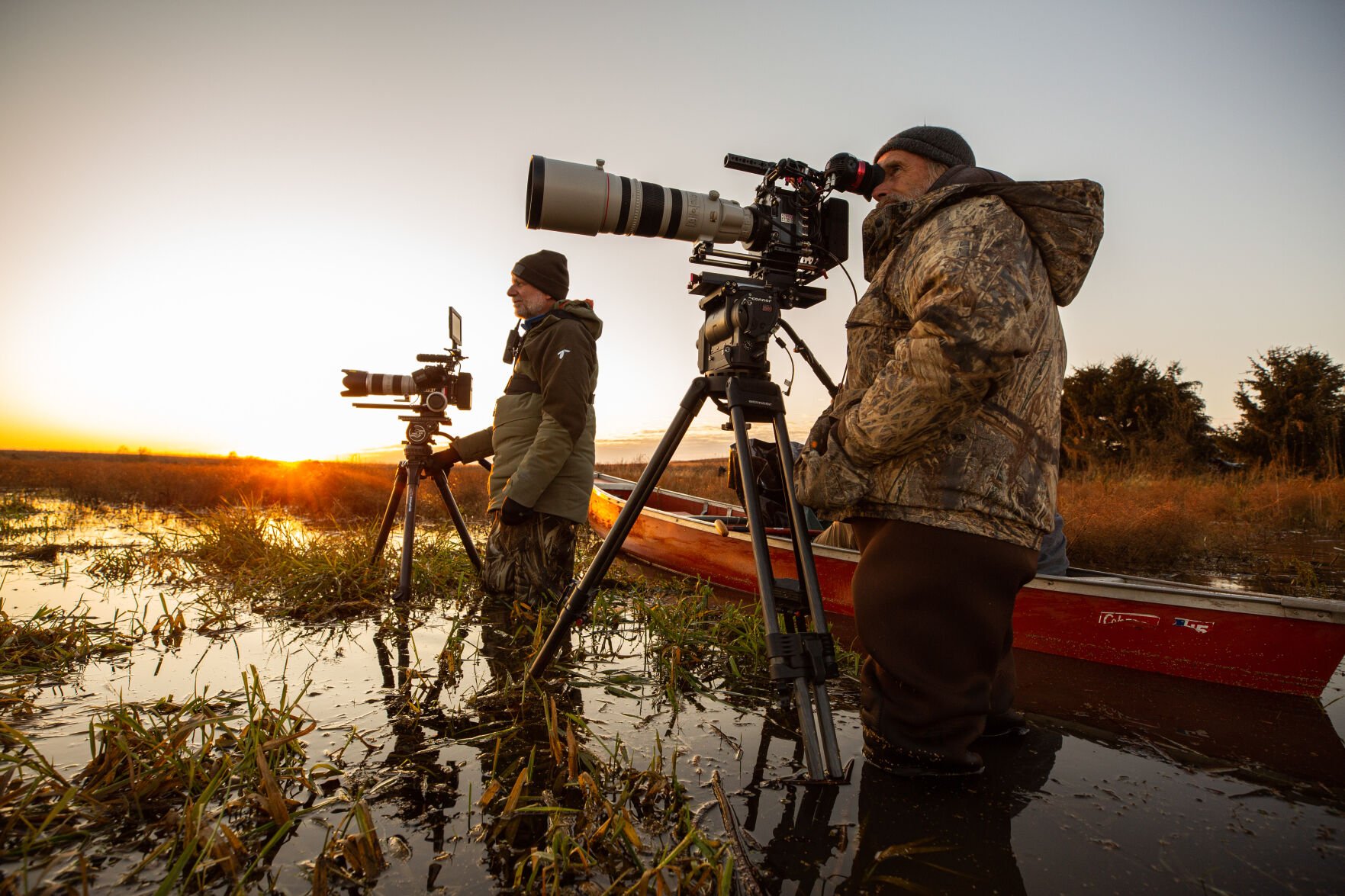 “Wings Over Water” director and producer Andrew Young and cinematographer Neil Rettig film in the prairie wetlands.