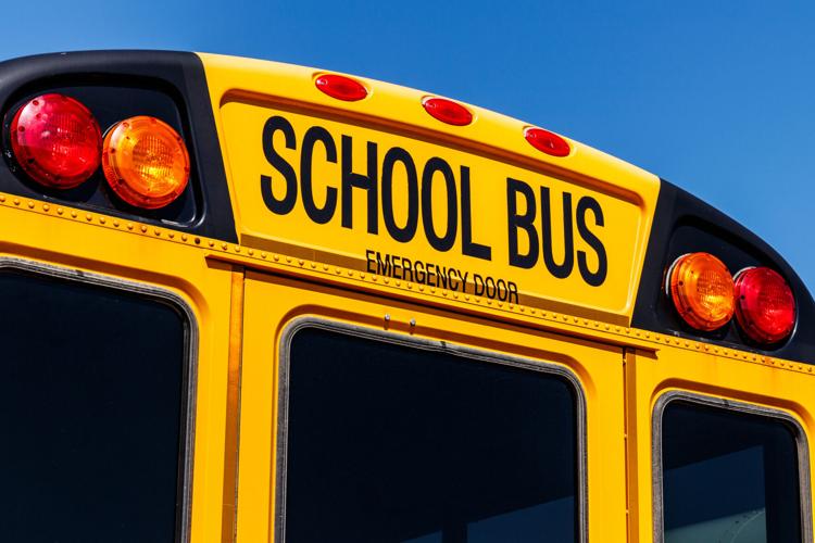 Yellow School Bus in a District Lot Waiting to Depart for Students