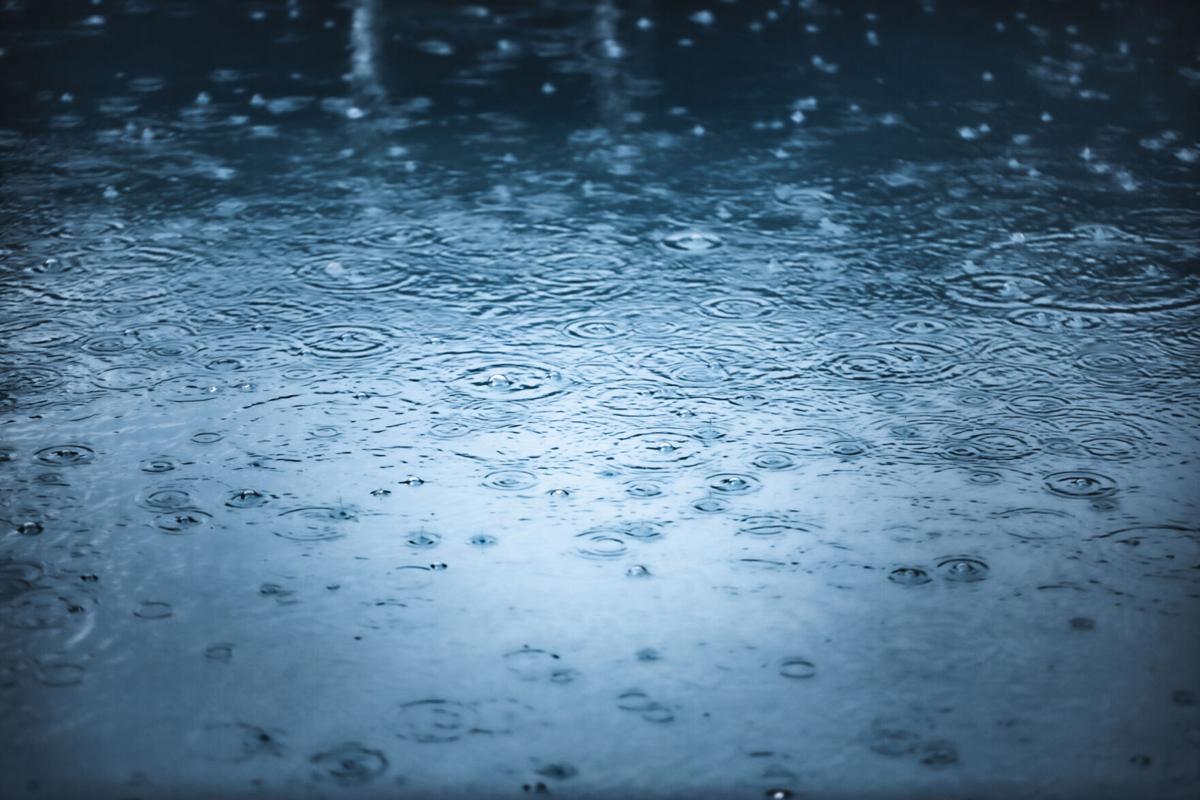 Rain fall on water background