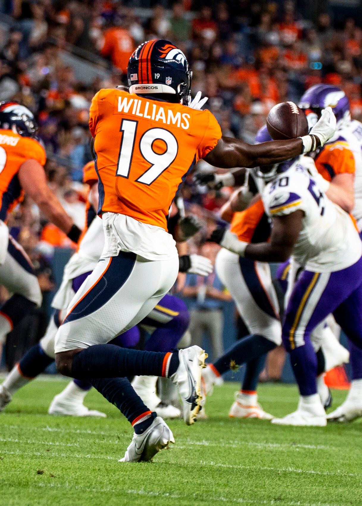 Denver Broncos wide receiver Seth Williams (19) reaches to make a catch during the second quarter of the third and final preseason game of the year agains the Minnesota Vikings at Empower Field at Mile High in Denver on Saturday, Aug. 27, 2022. (Parker Seibold / The Gazette) (Parker Seibold / The Gazette)