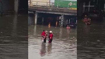 WATCH: 29 rescued from vehicles after heavy rain causes street flooding in Denver
