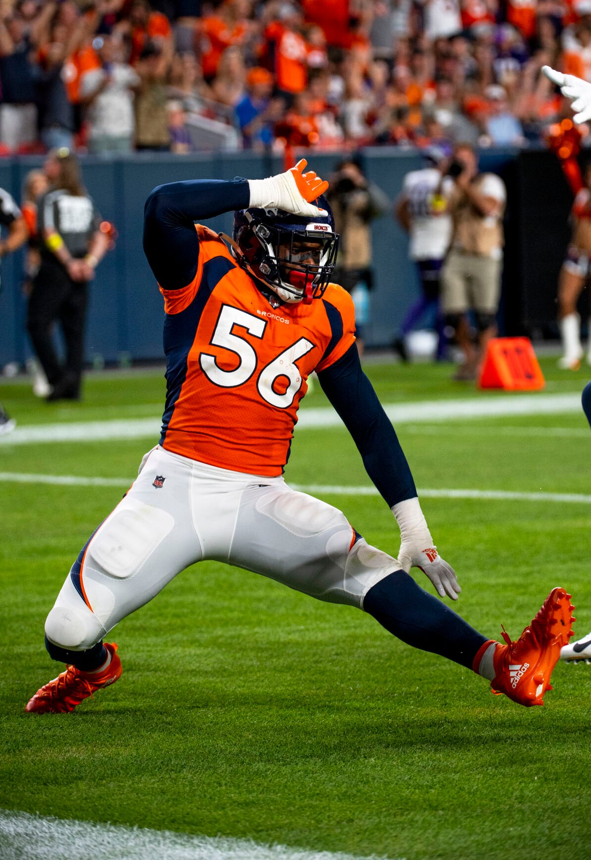 Denver Broncos linebacker Baron Browning (56) celebrates after scoring a touchdown during the game against the Minnesota Vikings at Empower Field at Mile High in Denver on Saturday, Aug. 27, 2022. (Parker Seibold / The Gazette) (Parker Seibold / The Gazette)