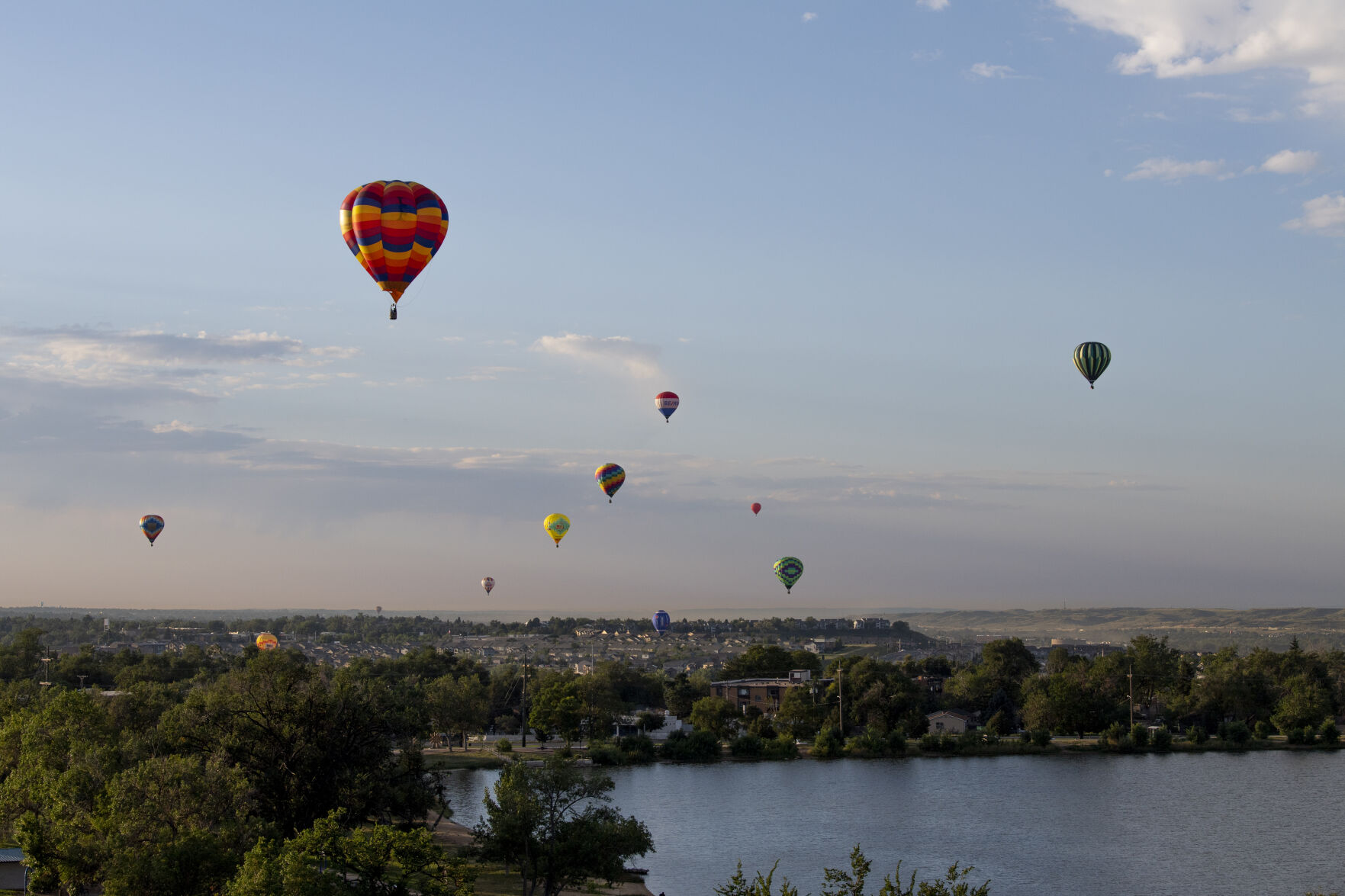 Hot air balloons fly over Colorado Springs on Friday, Sept. 2, 2022. (Parker Seibold / The Gazette) (Parker Seibold/ The Gazette)