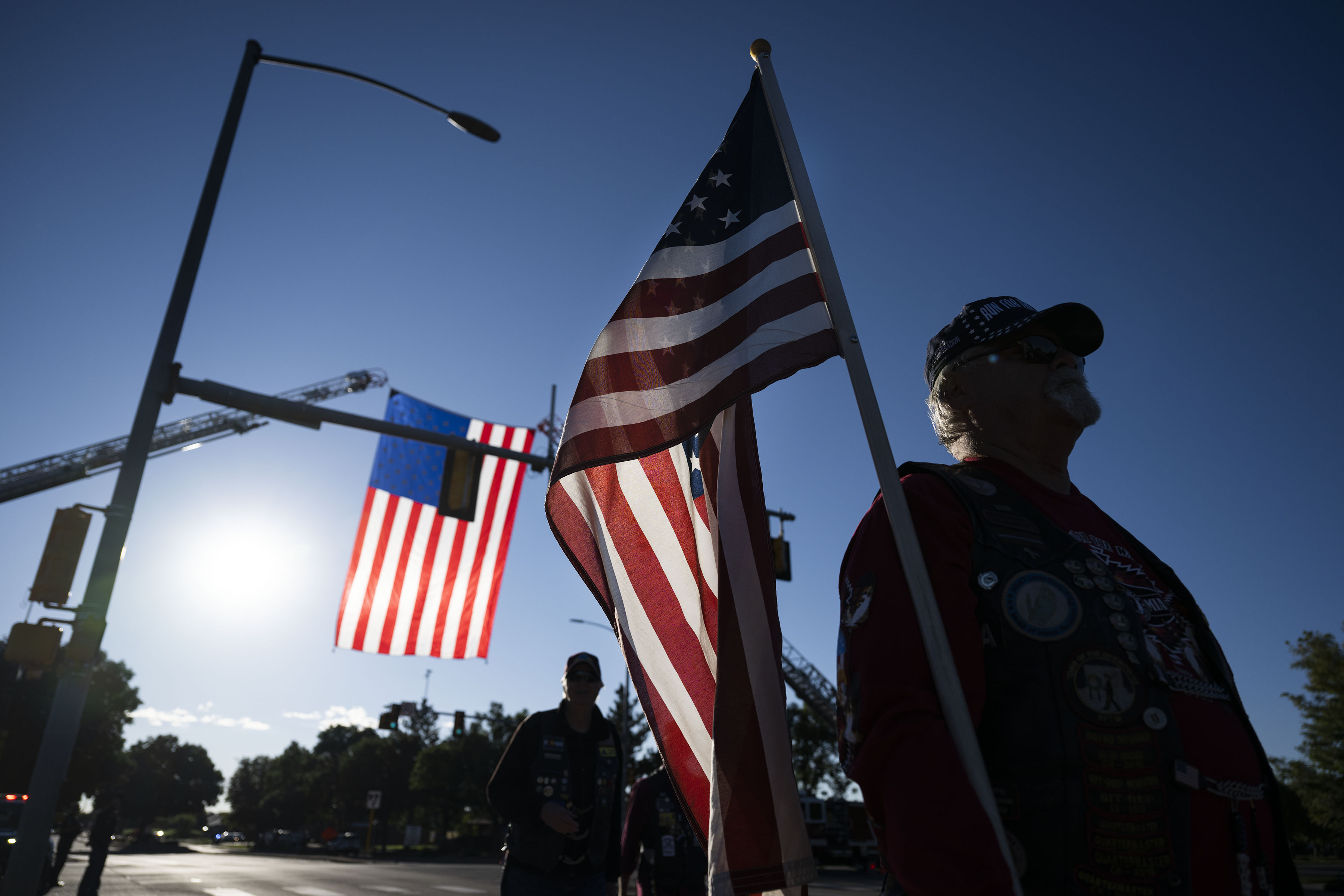 Dan Koster, with the Colorado Patriot Guard Riders carries an American flag before lining up with other riders before the the funeral procession for fallen Arvada Police officer Dillon Vakoff on Friday, Sept. 16, 2022, at Flatirons Community Church in Lafayette, Colo. Vakoff was killed in the line of duty last Sunday while responding to a call in Arvada. (Timothy Hurst/The Denver Gazette) (TimHursttim.hurst@gazette.comhttps://secure.gravatar.com/avatar/aca82bd62b4ee425c598527cd6faa1b1?d=mm&r=g)