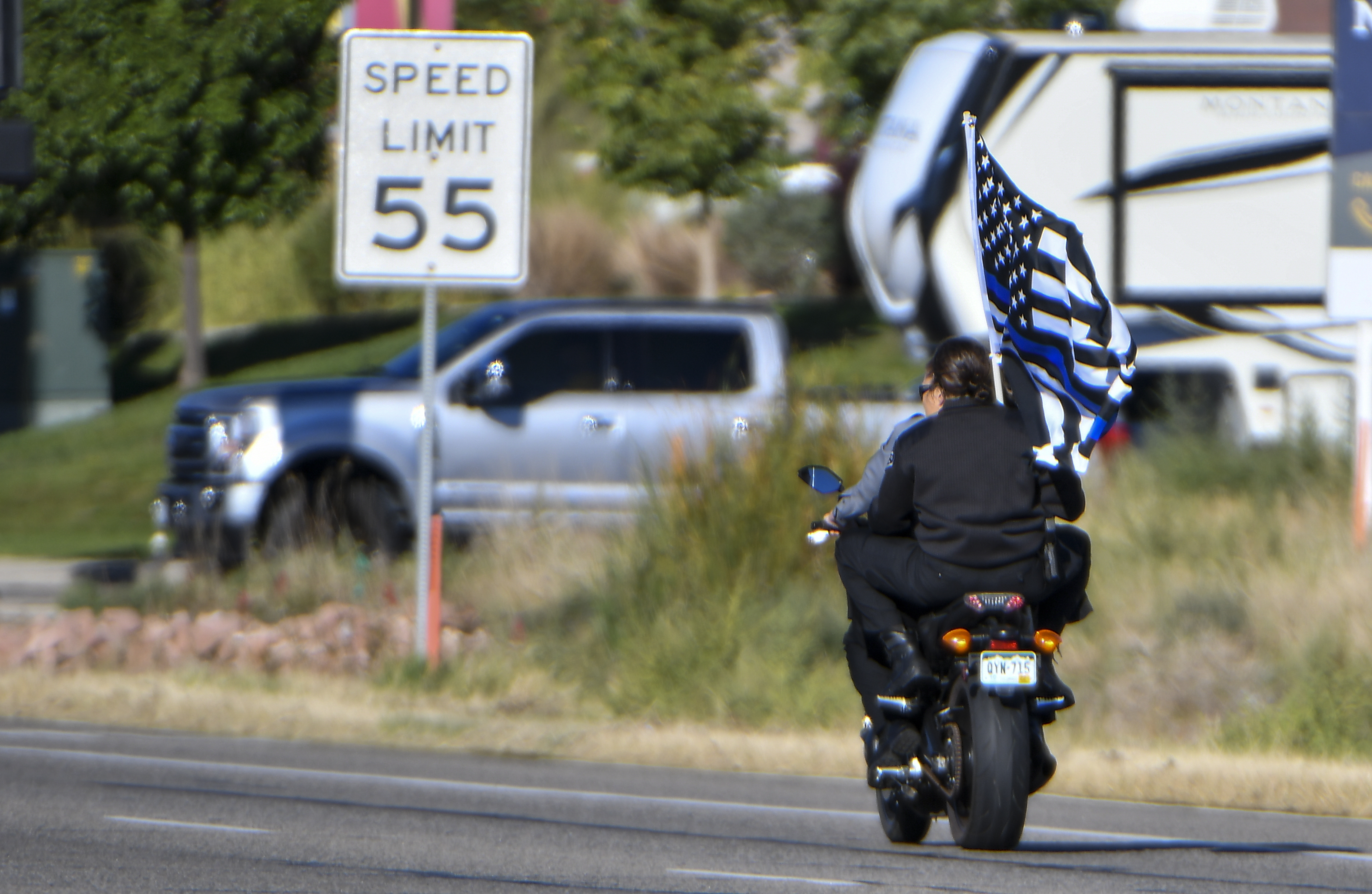 MARCH 14, 2021 - The procession for Weld County Sheriff Deputy Alexis Hein-Nutz heads down Hwy 34 headed to Foundations Church in Loveland. The Weld County Sheriff’s Office along with a multi-agency enforcement procession gathered at the Weld County Jail for the procession of Weld County Sheriff Deputy Alexis Hein-Nutz who was struck and killed by Norberto Garcia-Gonzales at an intersection in Weld County on Sept. 18. (Photo by John Leyba) (John Leyba)