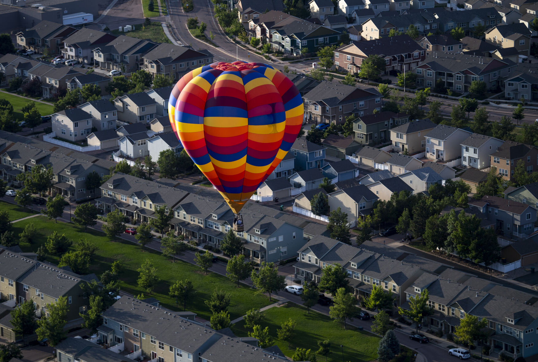 A hot air balloon flies over Colorado Springs on Friday, Sept. 2, 2022. (The Gazette, Parker Seibold) (The Gazetter Parker Seibold)