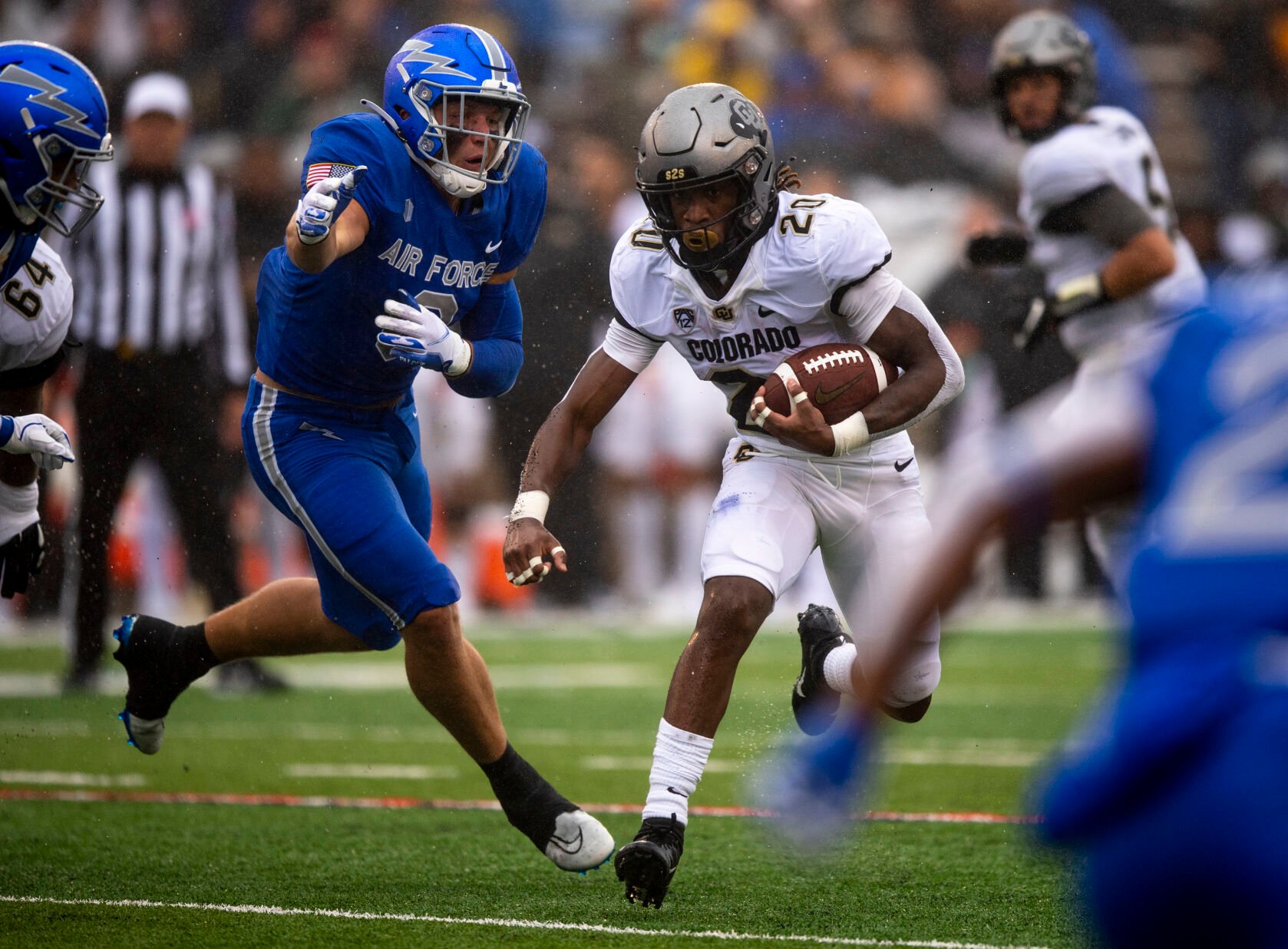 Colorado Buffaloes running back Deion Smith (20) makes a run during the third quarter of the game against the Air Force Falcons at Falcon Stadium in Colorado Springs, Colo., on Saturday, Sept. 10, 2022. The Falcons won 41-10. (The Gazette, Parker Seibold) (The Gazetter Parker Seibold)