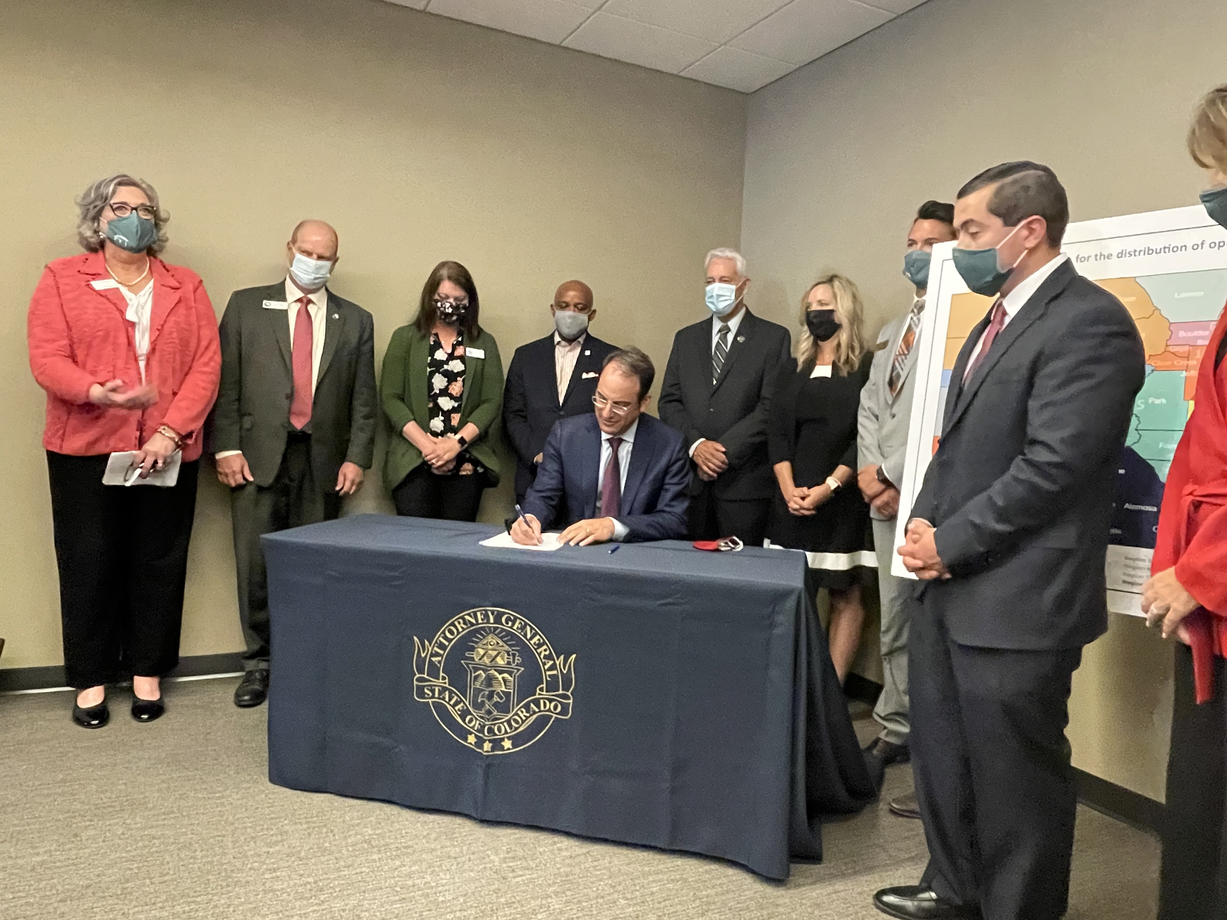 Colorado Attorney General Phil Weiser signs a memorandum of understanding regarding the nationwide opioid settlement. The first payment of $18 million was released to Colorado Thursday. Denver will receive $4.7 million. (JuliaCardiGeneral Assignment Reporterjulia.cardi@gazette.comhttps://secure.gravatar.com/avatar/3e548b6a43ff4b815b2d170f62f00495?d=mm&r=g)