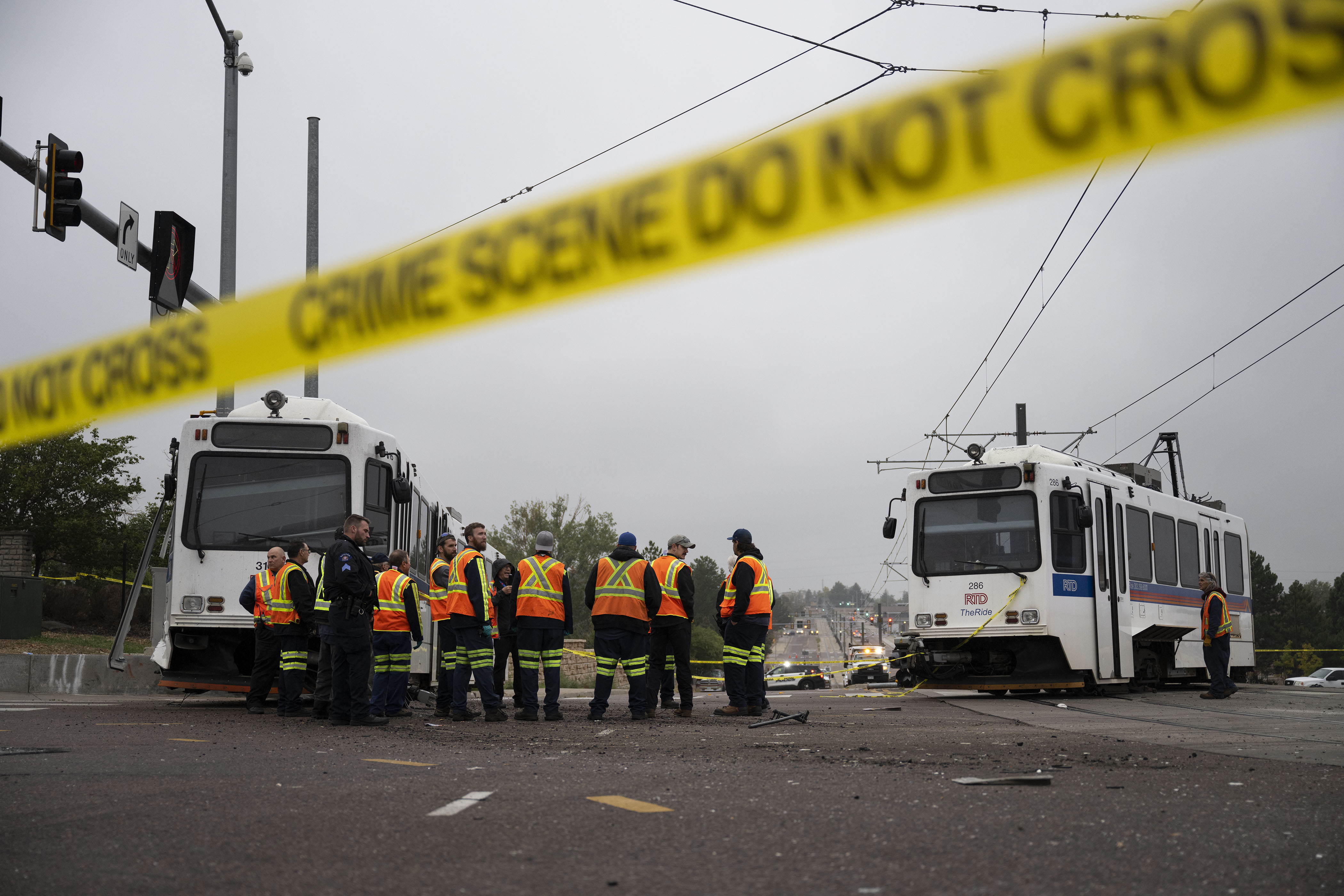 FILE PHOTO: Crews look over one section of a RTD light-rail train that derailed at the intersection of East Exposition Avenue and South Sable Boulevard on Wednesday, Sept. 21, in Aurora, Colo.(TIMOTHY HURST/THE DENVER GAZETTE) (TimHursttim.hurst@gazette.comhttps://secure.gravatar.com/avatar/aca82bd62b4ee425c598527cd6faa1b1?d=mm&r=g)