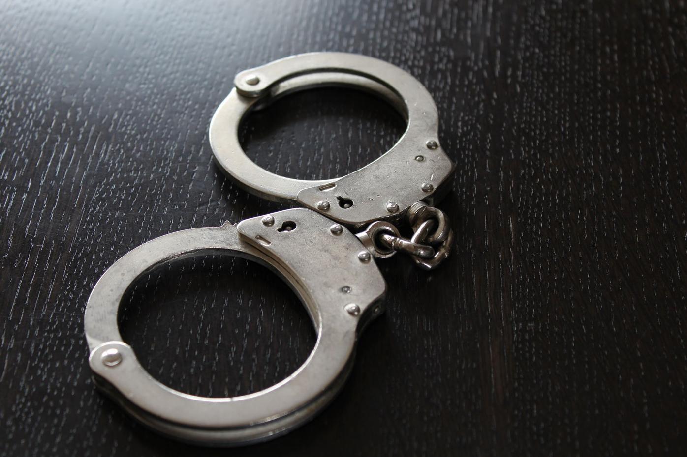 Police handcuffs on the table (copy)