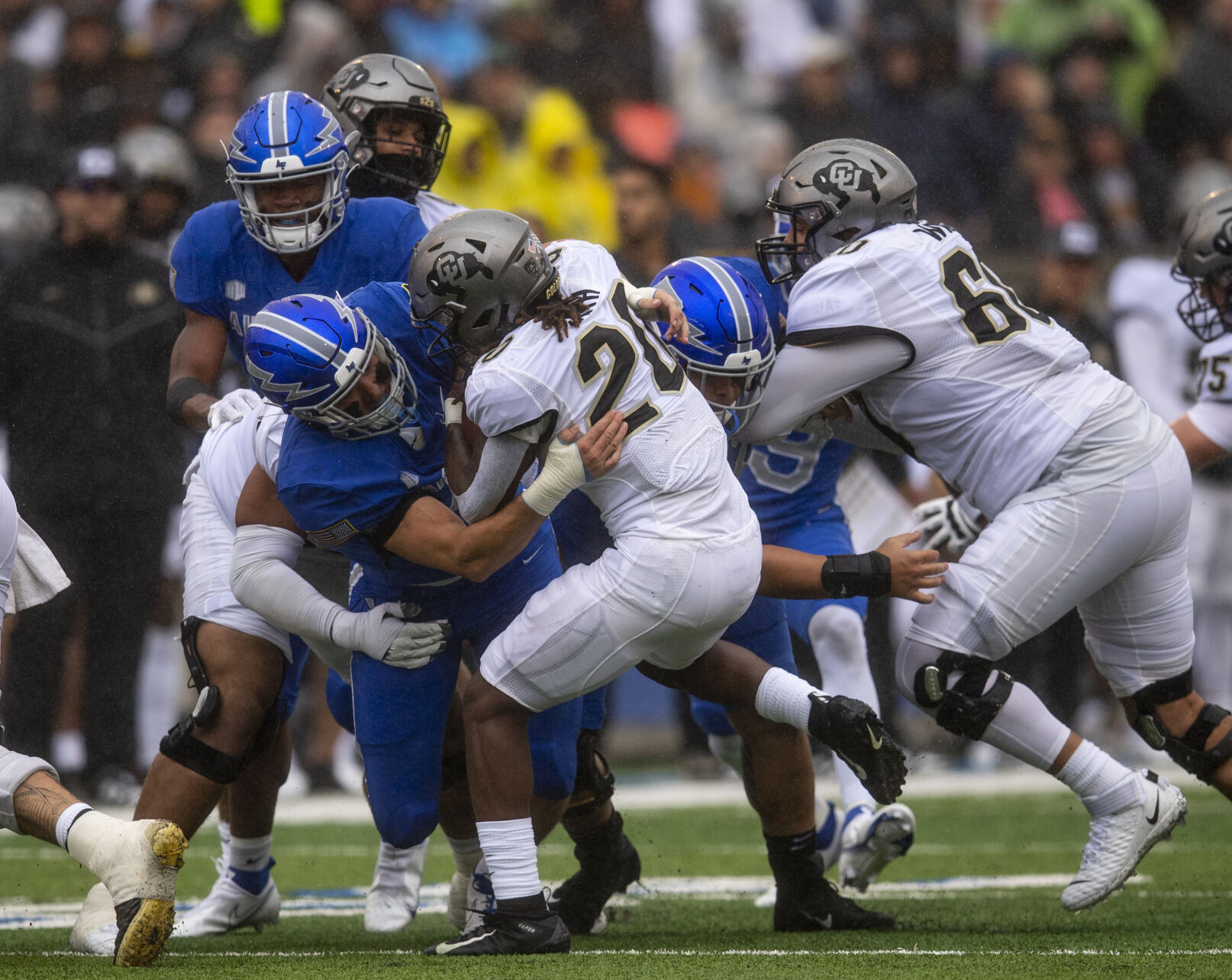 Air Force Falcons linebacker Alec Mock (40) tackles Colorado Buffaloes running back Deion Smith (20) during the first quarter of the game at Falcon Stadium in Colorado Springs, Colo., on Saturday, Sept. 10, 2022. (The Gazette, Parker Seibold) (Parker Seibold/ The Gazette)