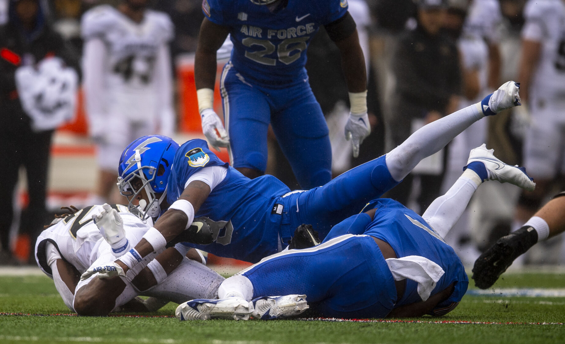 Air Force Falcons cornerback Michael Mack II (9) tackles Colorado Buffaloes running back Deion Smith (20) during the first quarter of the game against Colorado University Buffaloes at Falcon Stadium in Colorado Springs, Colo., on Saturday, Sept. 10, 2022. (The Gazette, Parker Seibold) (Parker Seibold/ The Gazette)