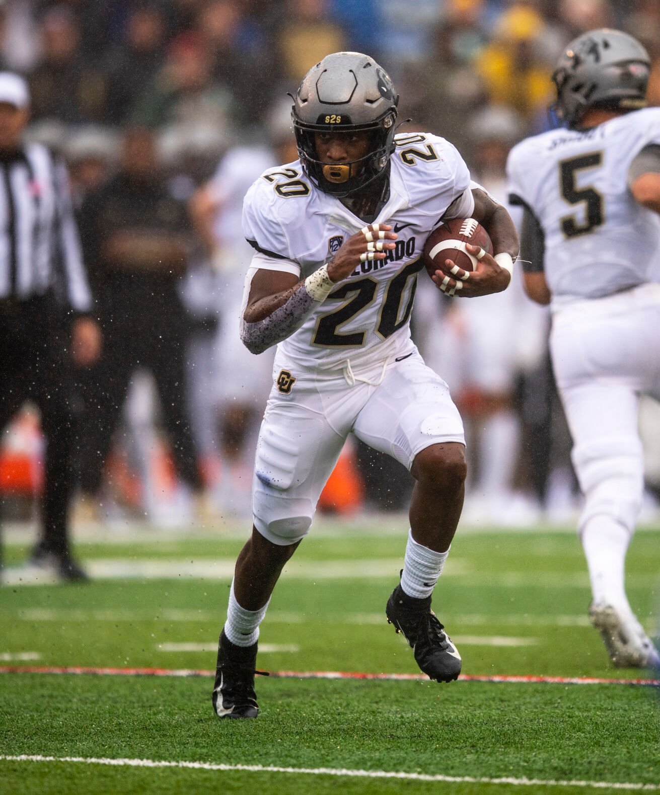 Colorado Buffaloes running back Deion Smith (20) makes a run against the Air Force Falcons at Falcon Stadium in Colorado Springs on Sept. 10. (Parker Seibold, Gazette file)