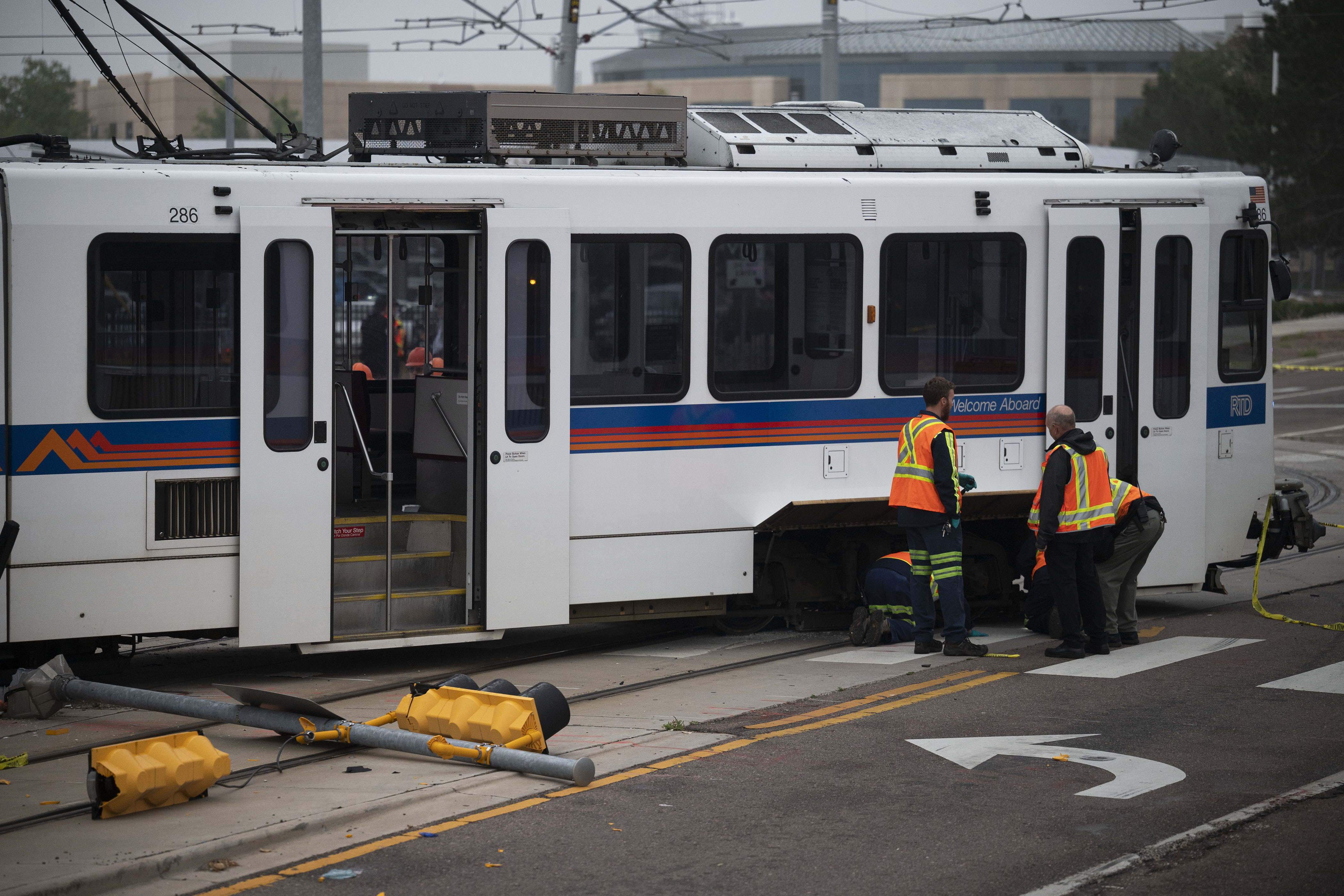 Crews work the scene where a RTD light-rail train derailed at the intersection of East Exposition Avenue and South Sable Boulevard on Wednesday, Sept. 21, in Aurora, Colo.(TIMOTHY HURST/THE DENVER GAZETTE) (TimHursttim.hurst@gazette.comhttps://secure.gravatar.com/avatar/aca82bd62b4ee425c598527cd6faa1b1?d=mm&r=g)