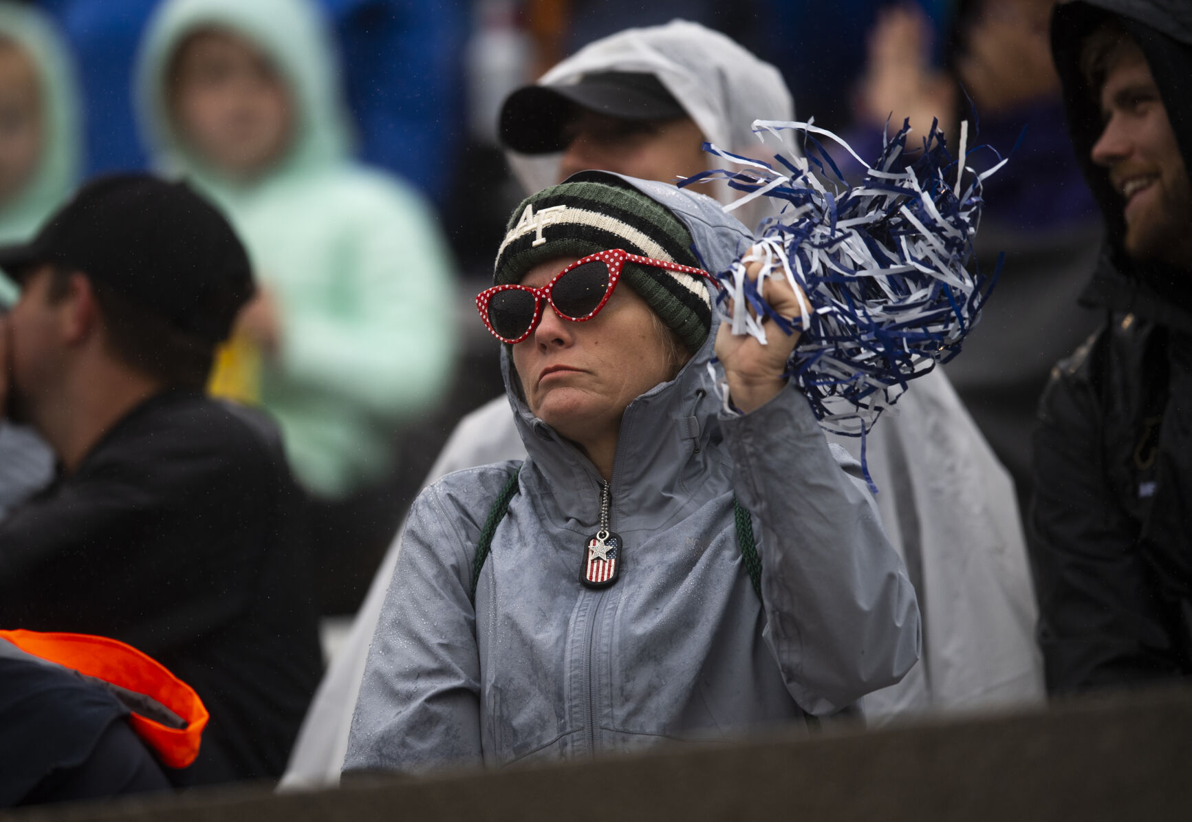 An Air Force Falcons fan waves a pompom during the game against Colorado University Buffaloes at Falcon Stadium in Colorado Springs, Colo., on Saturday, Sept. 10, 2022. (The Gazette, Parker Seibold) (Parker Seibold/ The Gazette)
