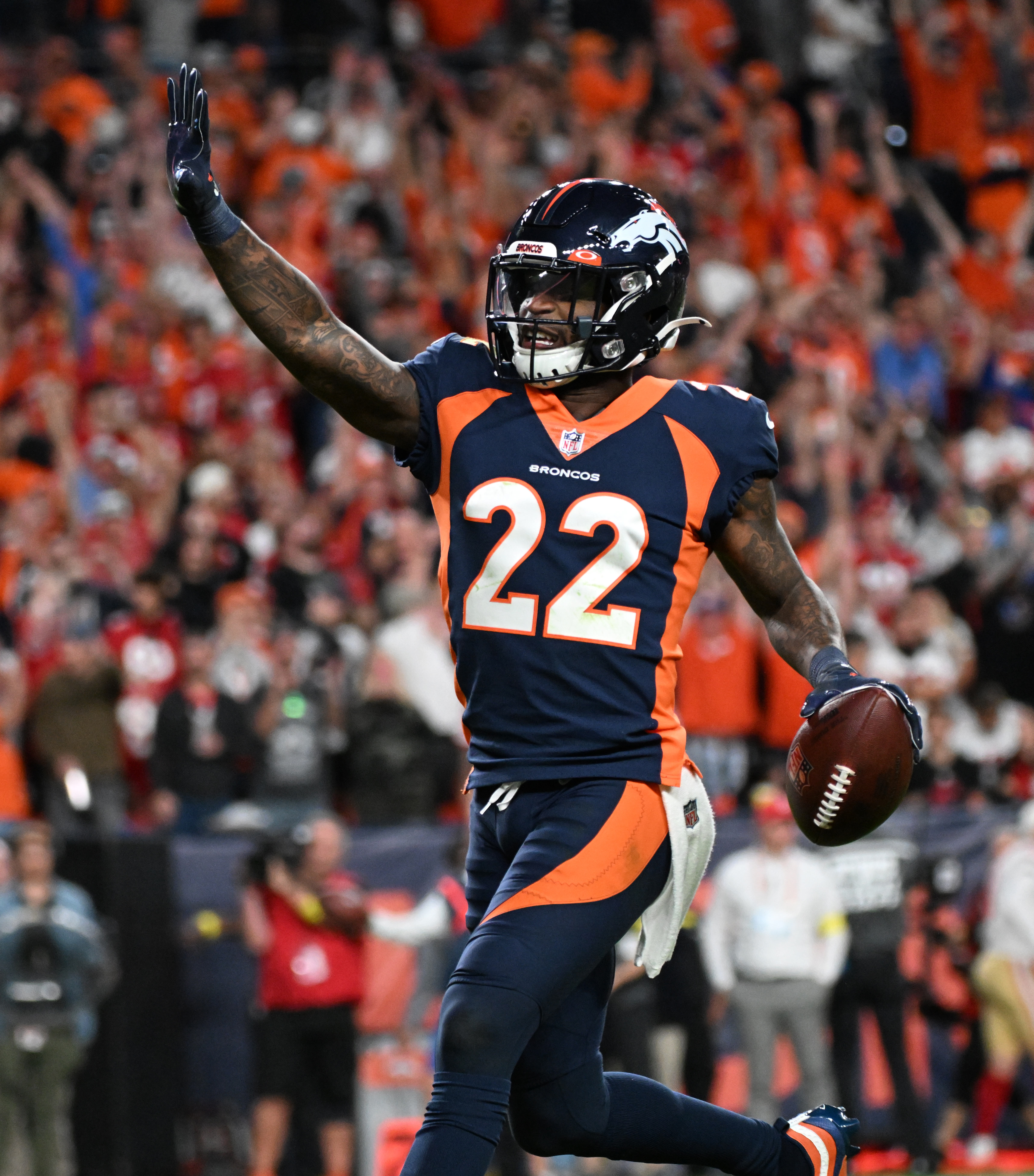 Denver Broncos safety Kareem Jackson (22) celebrates after recovering a fumble by San Francisco 49ers running back Jeff Wilson Jr. (22) to seal the Broncos’ 11-10 victory in the final minute of the fourth quarter Sunday, Sept. 25, 2022, at Empower Field at Mile High in Denver. (The Gazette, Christian Murdock) (Christian Murdock/The Gazette)