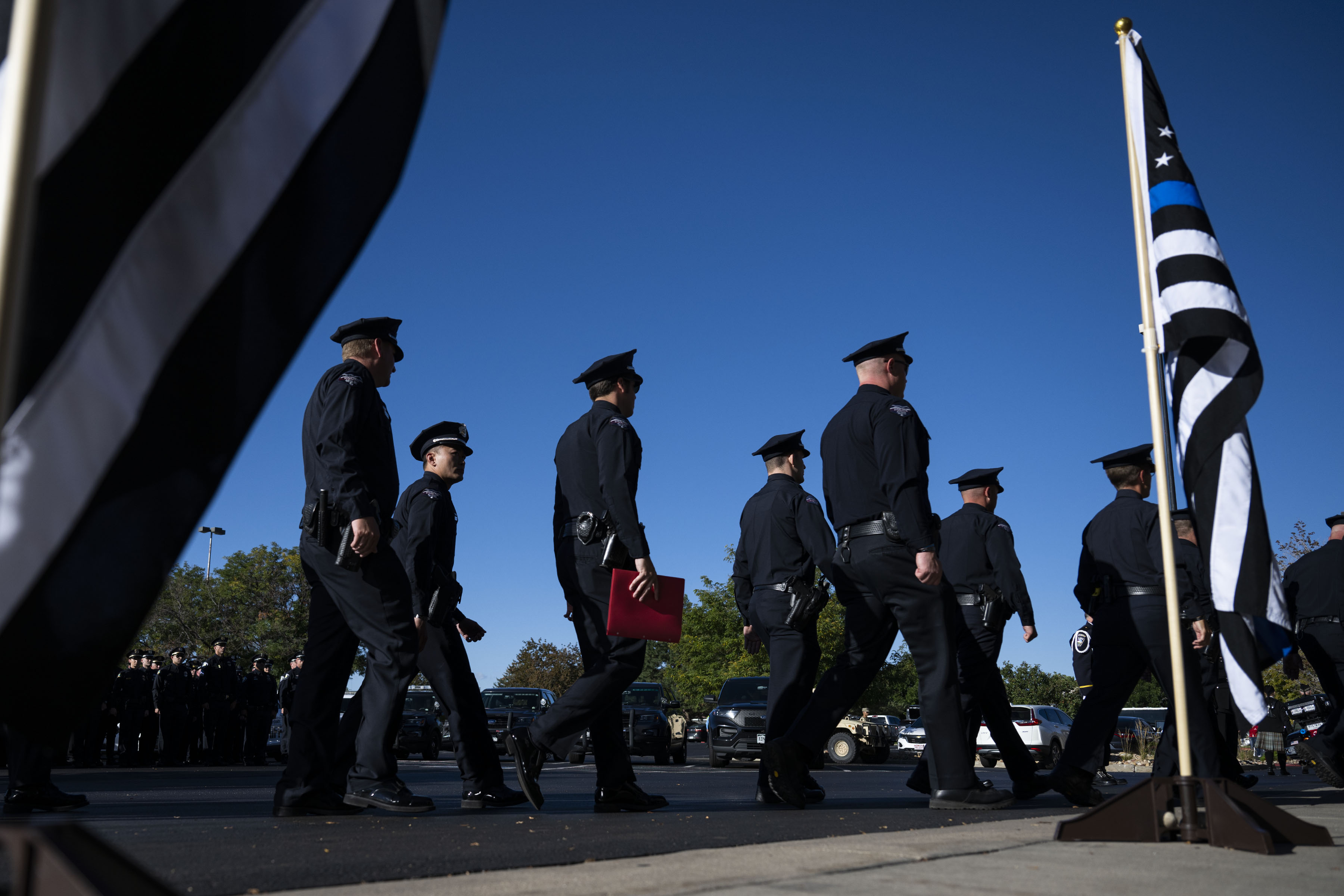 Police officers from surrounding areas enter the church following the funeral procession for fallen Arvada Police officer Dillon Vakoff on Friday, Sept. 16, 2022, at Flatirons Community Church in Lafayette, Colo. Vakoff was killed in the line of duty Sept. 11, 2022 while responding to a call in Arvada. (Timothy Hurst/The Denver Gazette) (TimHursttim.hurst@gazette.comhttps://secure.gravatar.com/avatar/aca82bd62b4ee425c598527cd6faa1b1?d=mm&r=g)