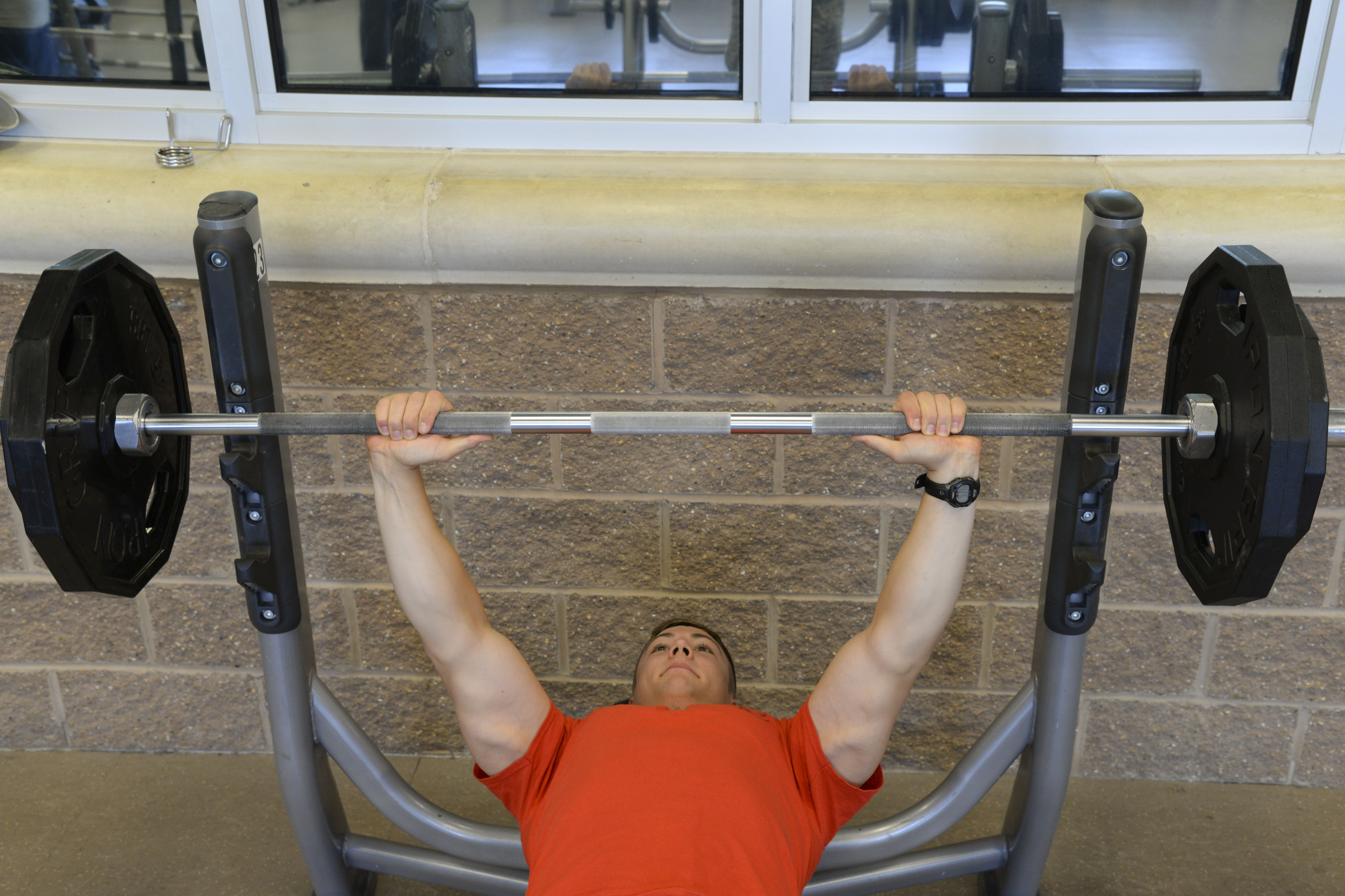 Airman 1st Class Dillon Vakoff, 96th Bomb Squadron aviation resource manager, prepares to bench press 185 pounds at the Senior Airman Bryan Bell Fitness Center at Barksdale Air Force Base, La., Aug. 31, 2015. Vakoff is the first Airman to complete the Bench a B-52 incentive program. The program was implemented by the 2nd Force Support Squadron to promote new fitness goals for Team Barksdale. ((U.S. Air Force photo/Senior Airman Jannelle Dickey))