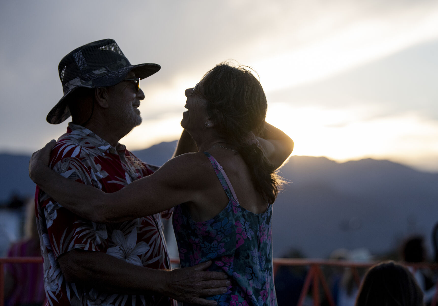 Spike Roberts and Jane dance to Reminiscent Soul as the sun sets behind Pikes Peak during Labor Day Lift Off at Memorial Park on Saturday, Sept. 3, 2022. (The Gazette, Parker Seibold) (Parker Seibold/ The Gazette)