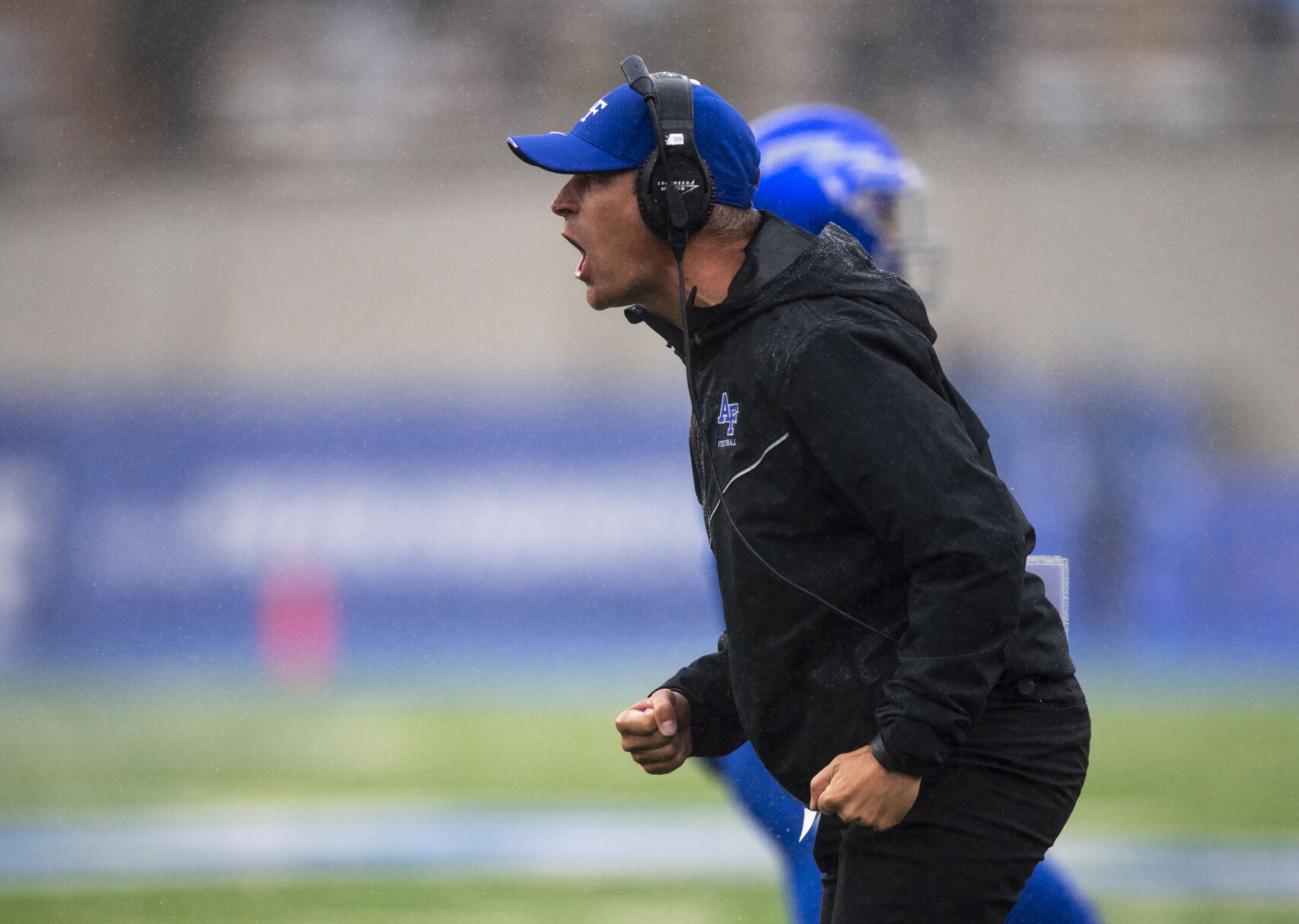 An Air Force Falcons coach celebrates after the Colorado Buffaloes fumble the ball near the end zone during the game at Falcon Stadium in Colorado Springs, Colo., on Saturday, Sept. 10, 2022. (The Gazette, Parker Seibold) (The Gazetter Parker Seibold)