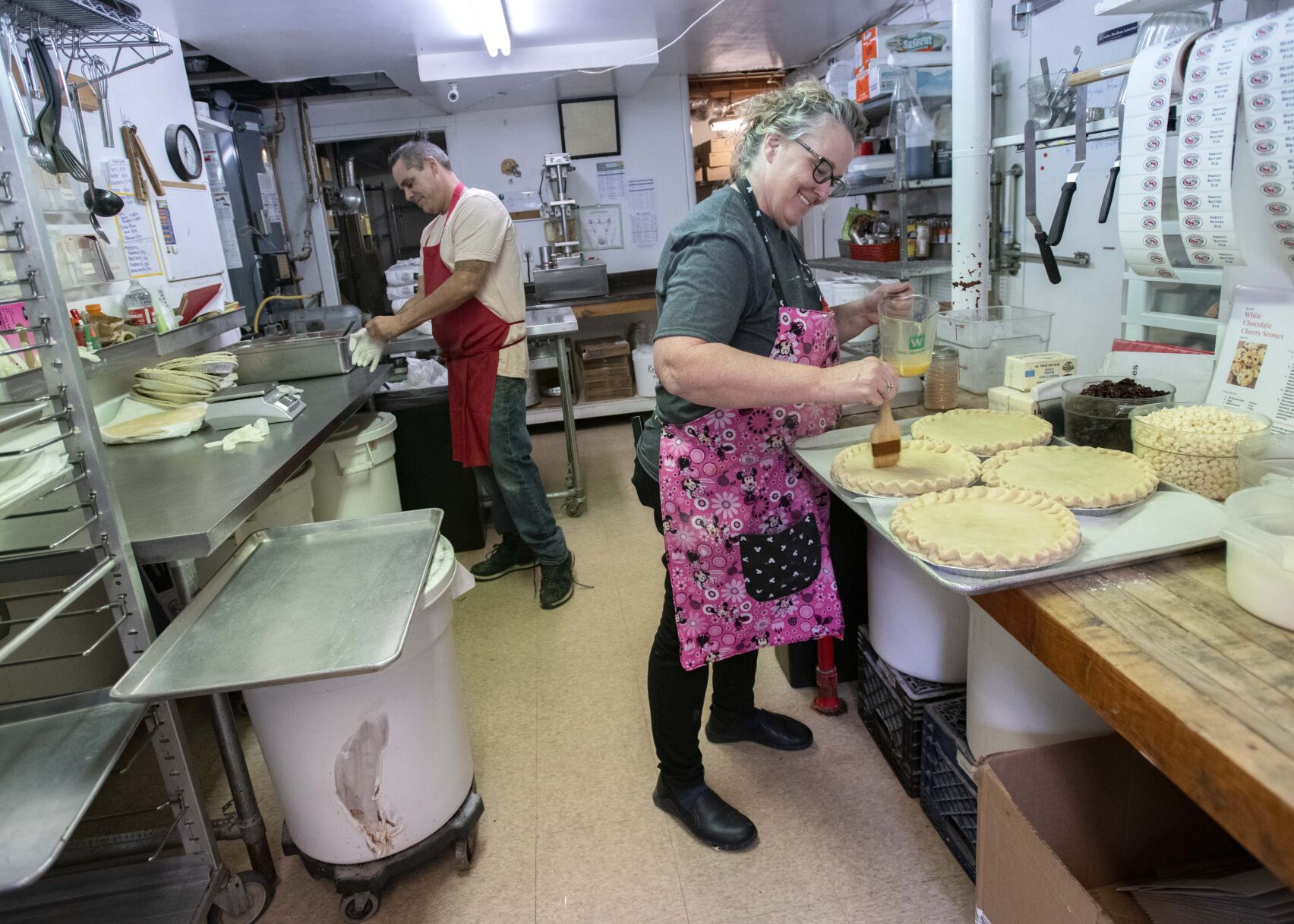 Baking manager Kris Quartermus, right, and baker Garrison Gardner make Colorado Cherry Co.'s famous cherry pie Tuesday, Sept. 27, 2022, at the Lyons restaurant. (The Gazette, Christian Murdock) (Christian Murdock/The Gazette)