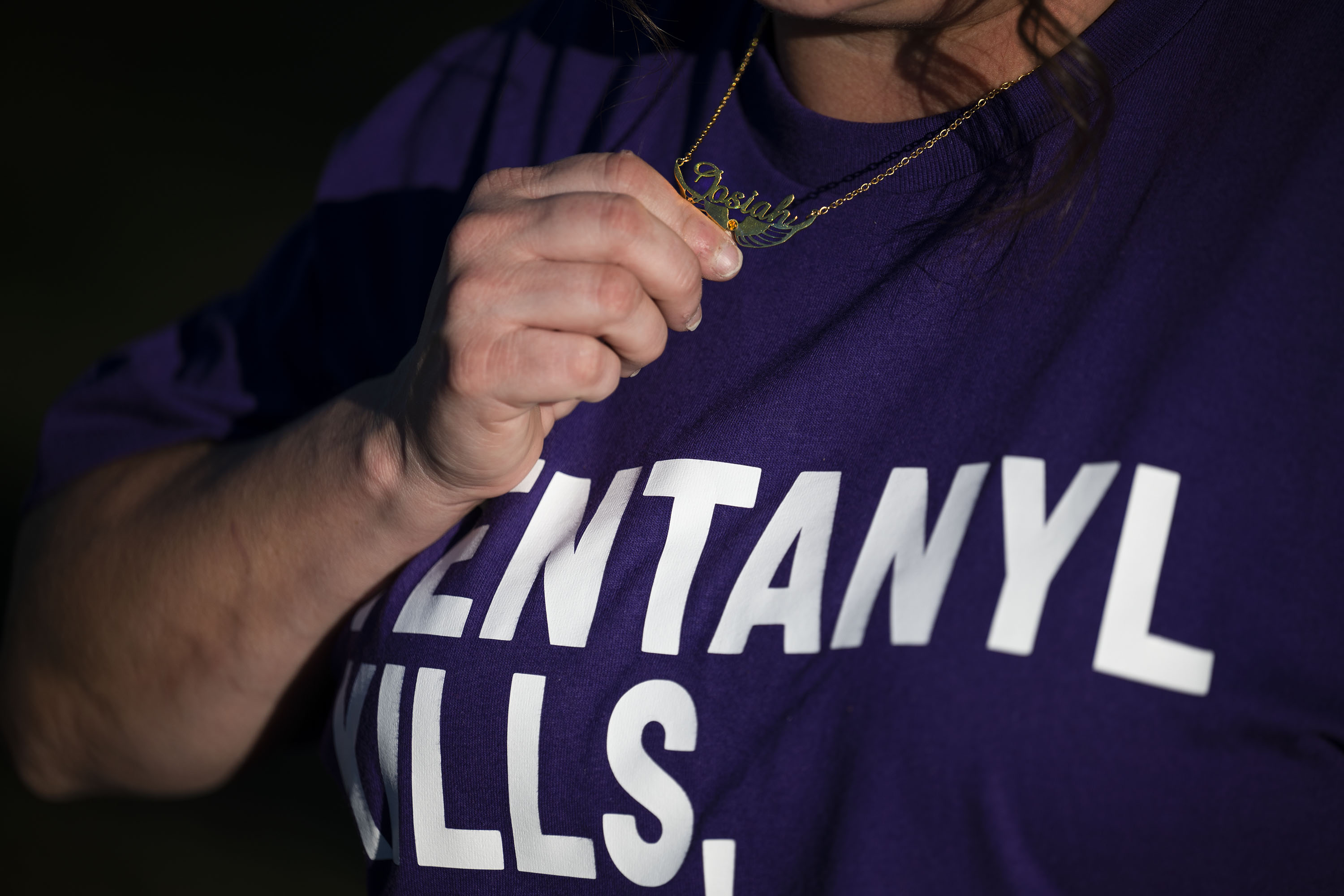 Christina Luna, the mother of Josiah Velasquez, holds the necklace pennant with his name while standing for a portrait on Thursday, Oct. 20, 2022, at the Crown Hill Cemetery in Lakewood, Colo. (Timothy Hurst/The Gazette) (TimHursttim.hurst@gazette.comhttps://secure.gravatar.com/avatar/aca82bd62b4ee425c598527cd6faa1b1?d=mm&r=g)