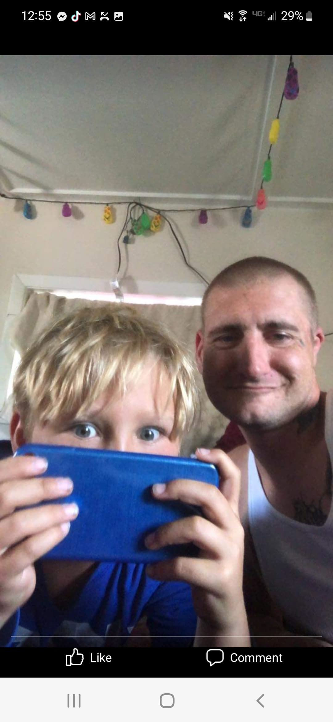 James Weatherbee III and his father, James Weatherbee II clowning around with a phone his dad bought him for this birthday. Weatherbee drowned last February after ingesting fentanyl and methamphetamine. Young James, who was 12 years old in this photo, is now 14. (Erica Rankin)