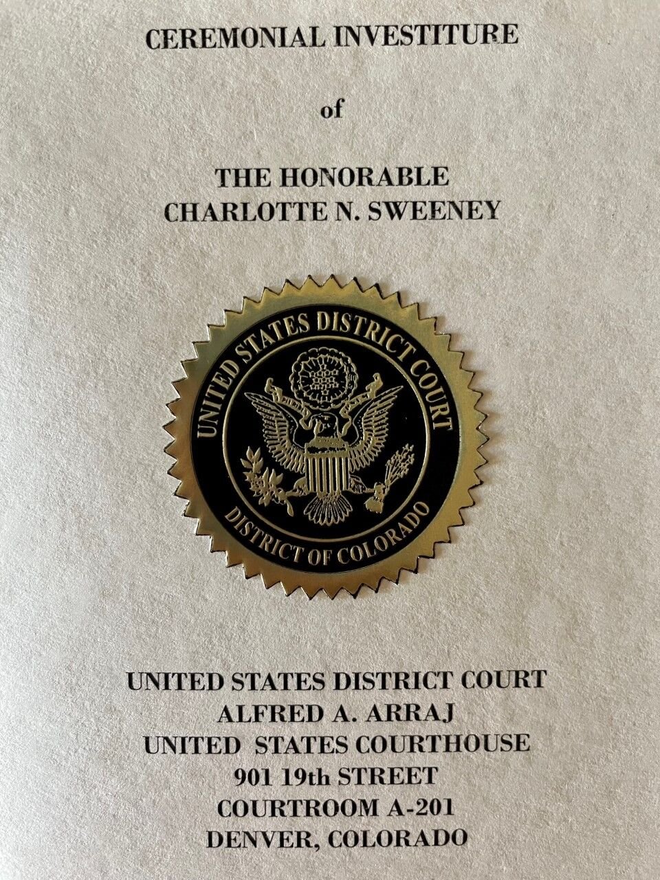 A program from the investiture of U.S. District Court Judge Charlotte N. Sweeney on Oct. 21, 2022.
