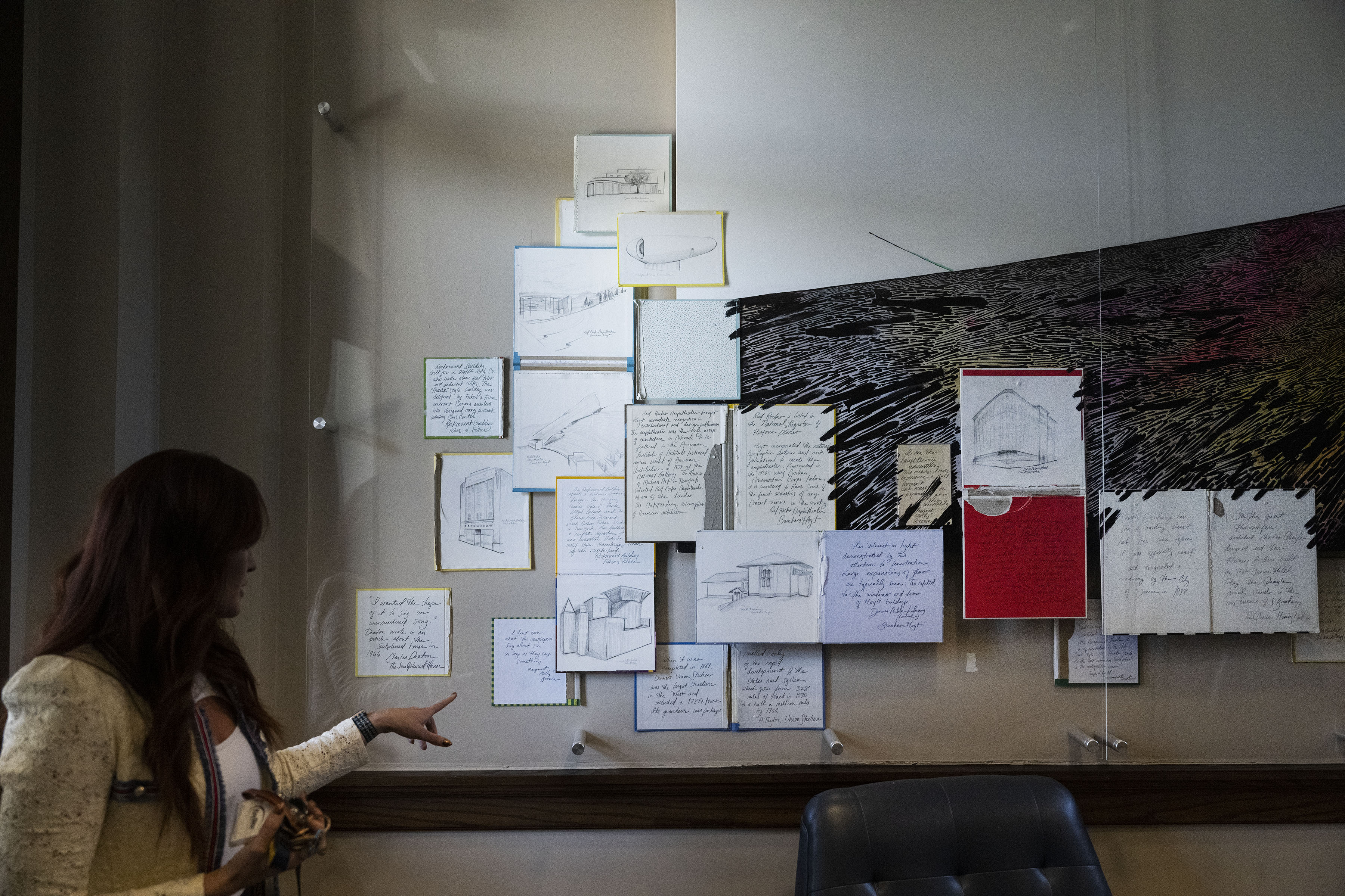 Zócalo Community Development Senior Director of Real Estate Lisa Jefferies points to quotes on the wall from historic Denver figures and drawings of historic Denver buildings on display in the front lobby of the building on Friday, Oct. 21, 2022, at The Quayle Building at North Broadway and West 1st Avenue of Denver, Colo. (Timothy Hurst/The Gazette) (TimHursttim.hurst@gazette.comhttps://secure.gravatar.com/avatar/aca82bd62b4ee425c598527cd6faa1b1?d=mm&r=g)