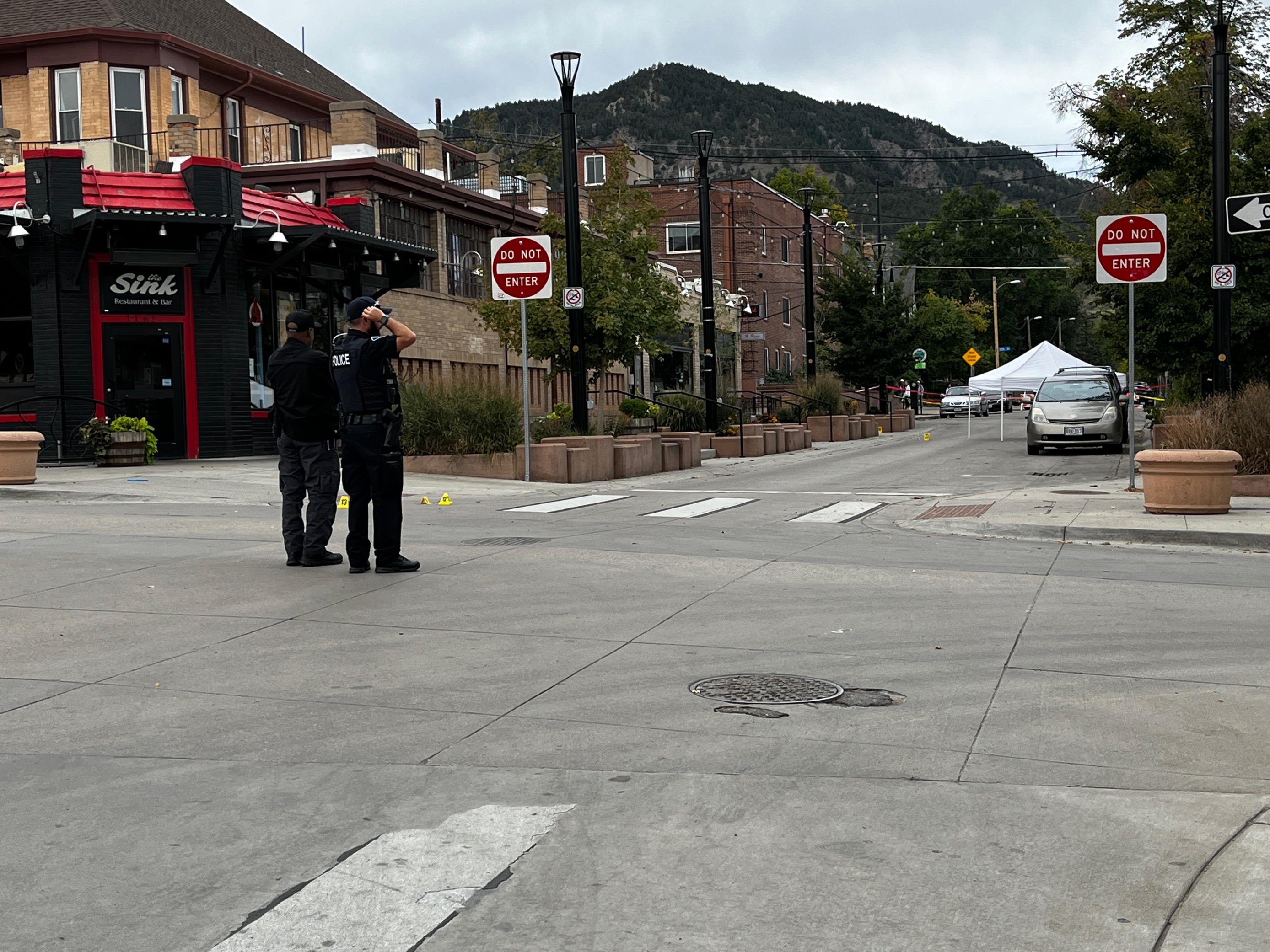 Boulder Police officer investigate a crime scene in the city's popular The Hill neighborhood near Pennsylvania Avenue and Broadway Sunday morning. An officer-involved shooting overnight sent one suspect to the hospital with gunshot wound to the arm. No officers were injured. (AlexanderEdwardsBusiness Reporteralex.edwards@gazette.comhttps://secure.gravatar.com/avatar/dbaa50cc8a9183e280c297e3afa72ace?d=mm&r=g)