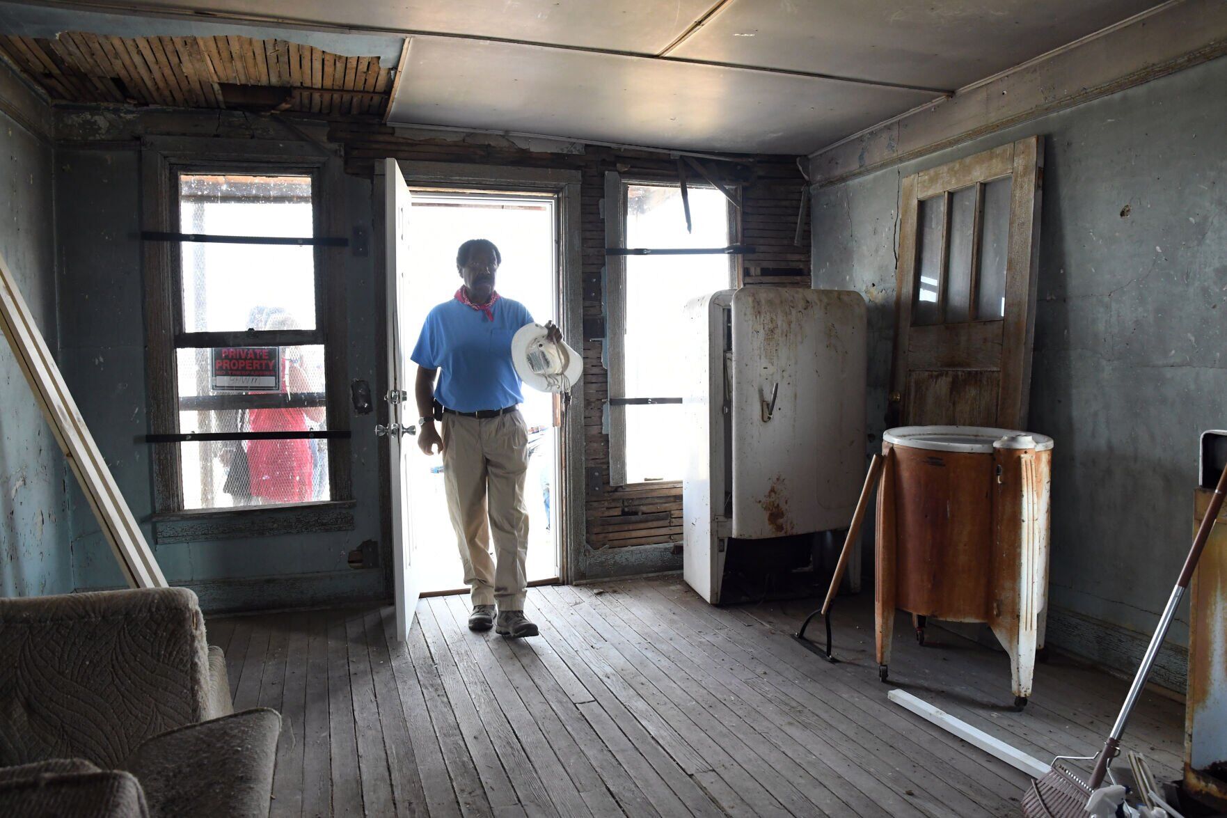 WELD COUNTY, CO - JULY 21: Dr. George Junne, professor of Africana Studies from the University of Northern Colorado, enters the Dearfield Lodge/Jackson House as he helps lead members of the Colorado General Assembly and Weld County officials on an historic tour of the Dearfield townsite located about 24 miles miles east of Greeley on July 21, 2021 in Weld County, Colorado. The group learned about the Deerfield Dream Project that emphasizes, archeological, historical, and environmental studies as well as protection of historic buildings and preservation of the early 20th Century African American colony of Dearfield. (Photo By Kathryn Scott) (Kathryn Scott)