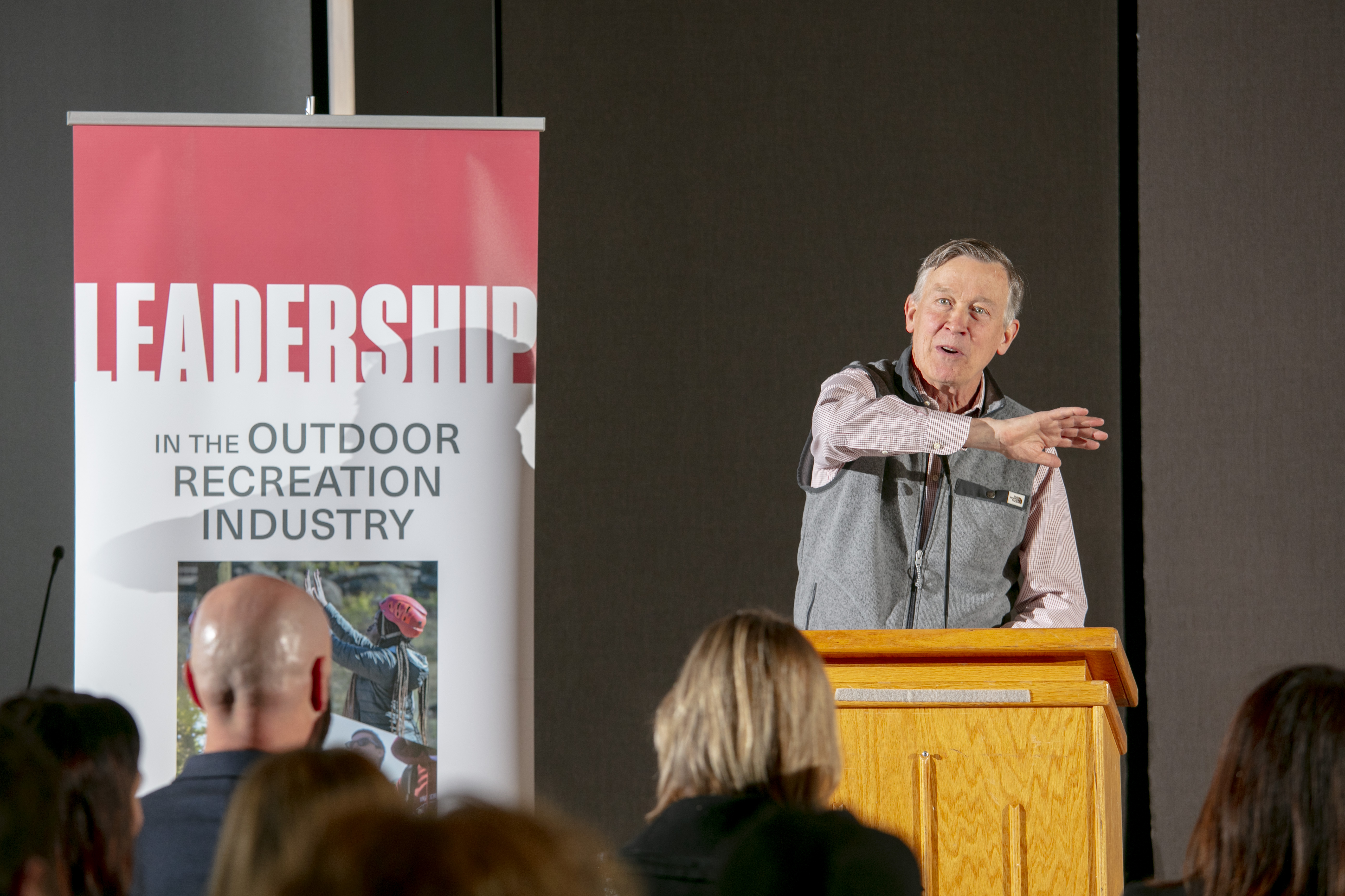 U.S. Senator John Hickenlooper (D-Colo.) speaks during unveiling of the University of Denver and VF Foundation's Leadership in Outdoor Recreation Industry during a press conference at the Community Commons Oct. 31, 2022. (COURTESY OF THE UNIVERSITY OF DENVER/BEAR GUTIERREZ)