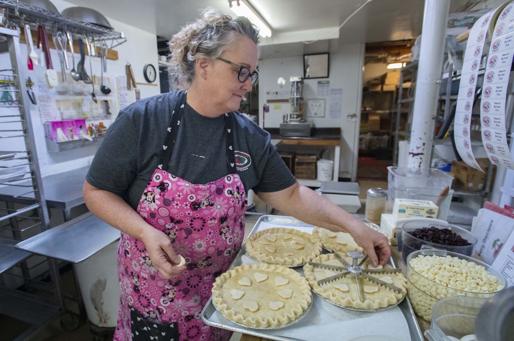 Baking manager Kris Quartermus add the finishing touches to Colorado Cherry Co.’s famous cherry pie Tuesday, Sept. 27, 2022, at the Lyons restaurant. (The Gazette, Christian Murdock) (Christian Murdock/The Gazette)