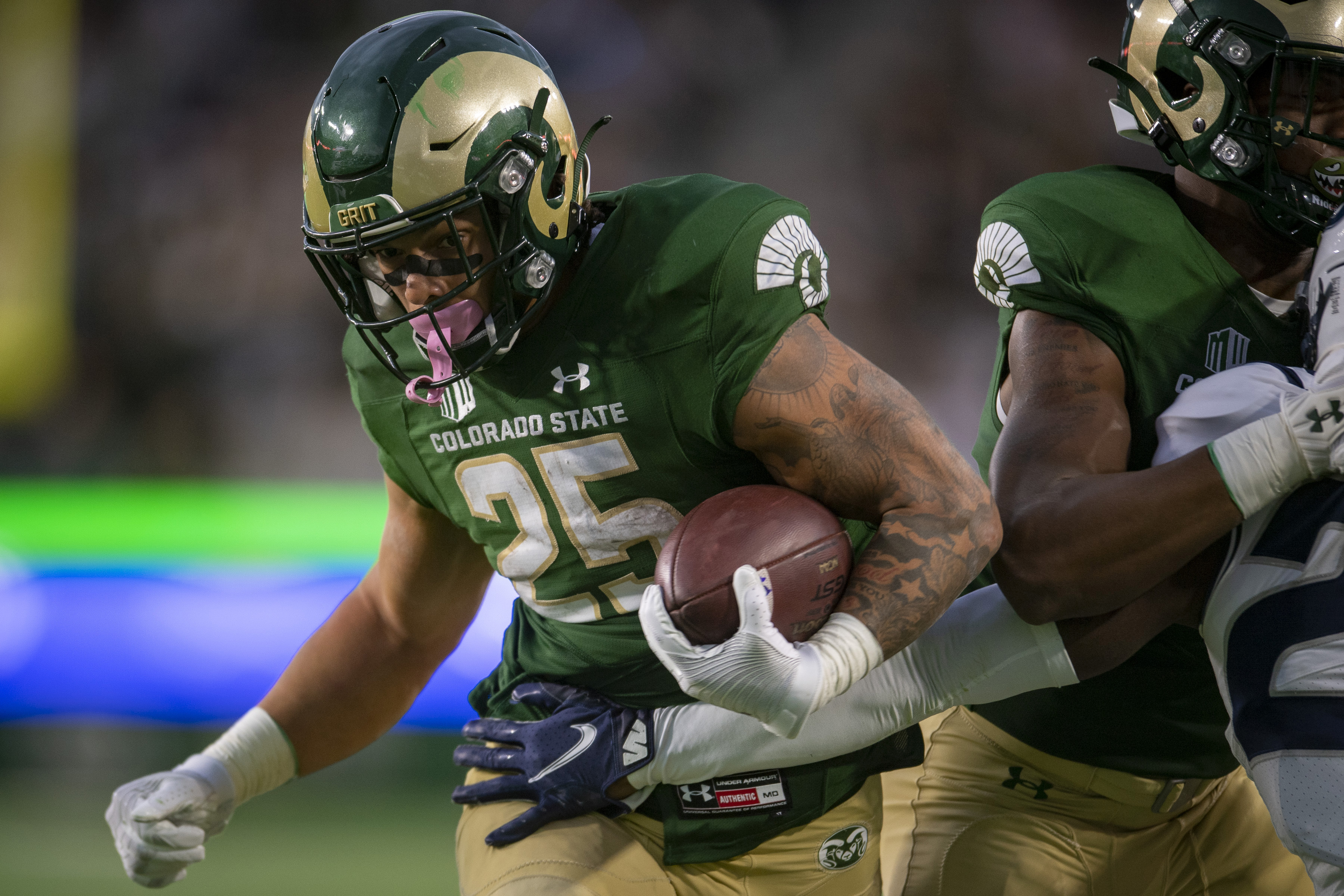Colorado State running back Avery Morrow scores a touchdown against Utah State during an NCAA college football game in Fort Collins, Colo., Saturday, Oct. 15, 2022. (Jon Austria/The Coloradoan via AP) (Jon Austria)